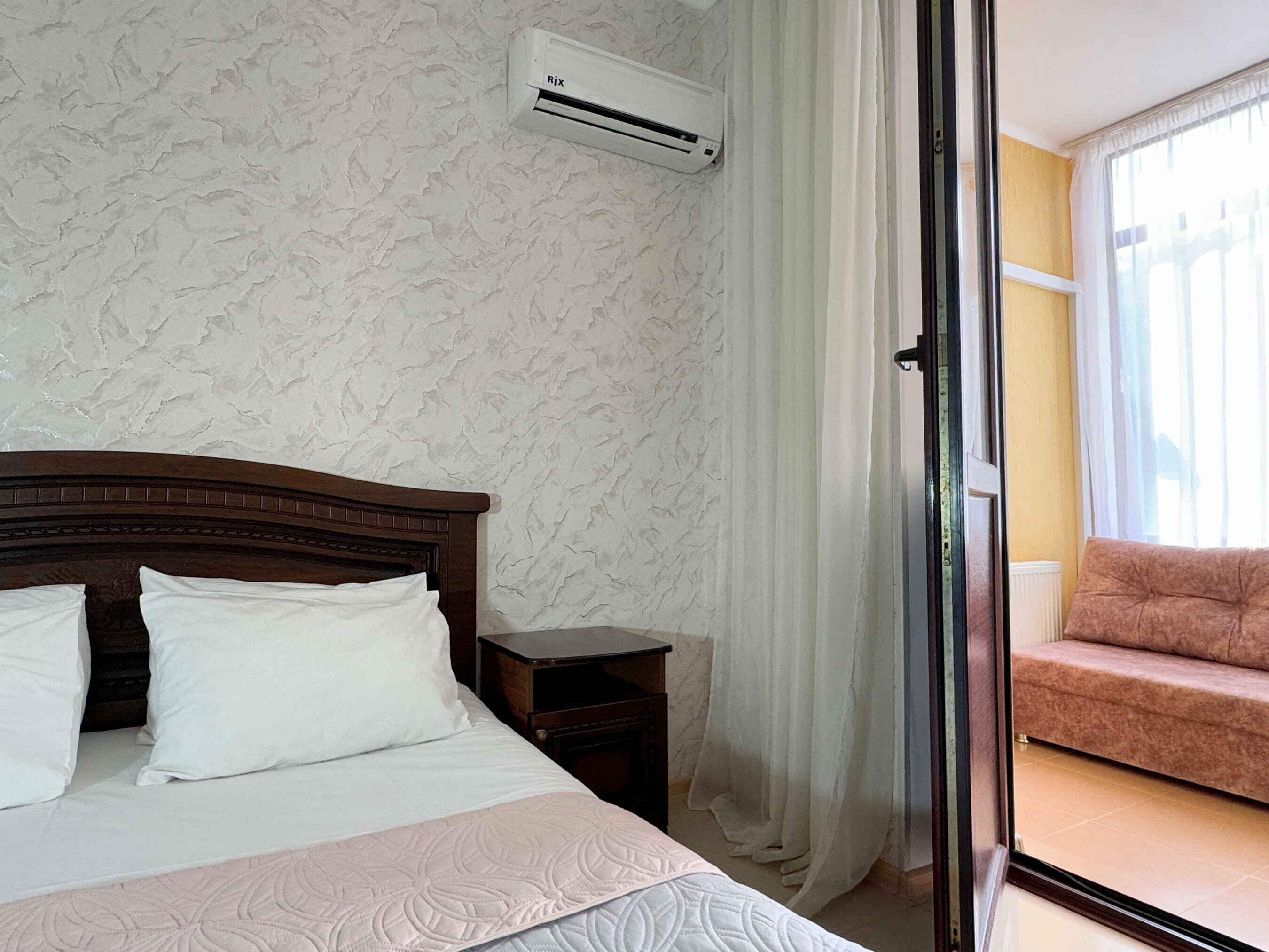 Четырехместный номер с балконом