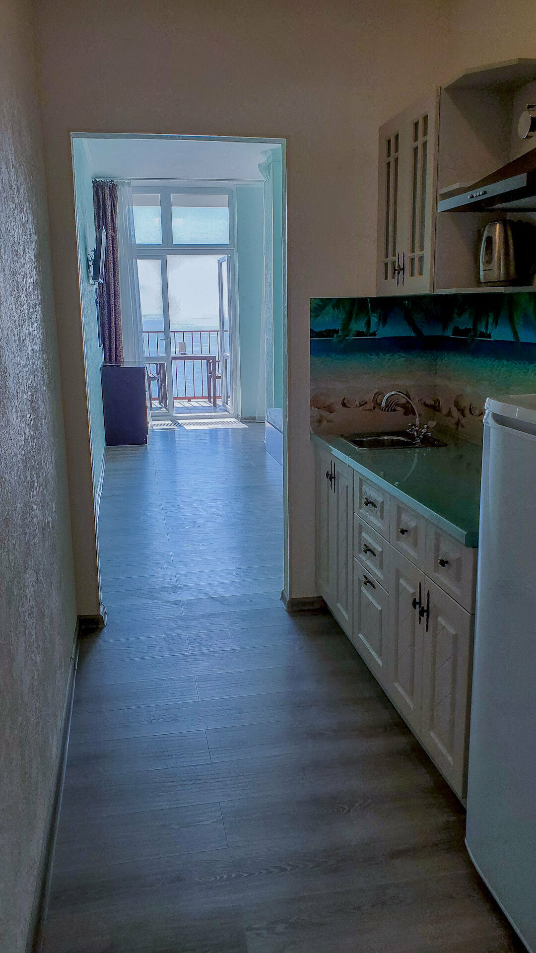 Двухместный однокомнатный люкс с кухней и видом на море