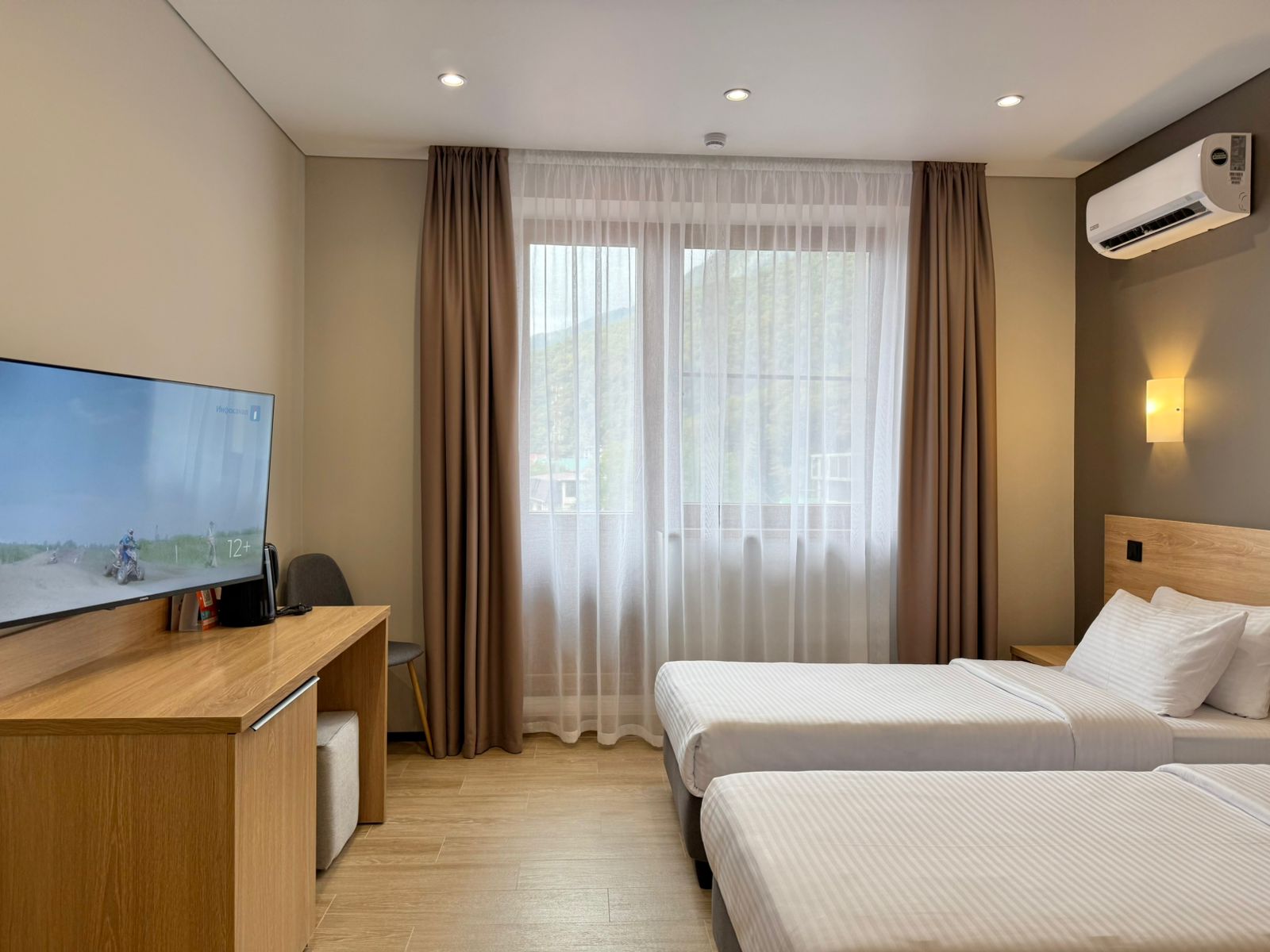 Двухместный номер с 2 отдельными кроватями и балконом