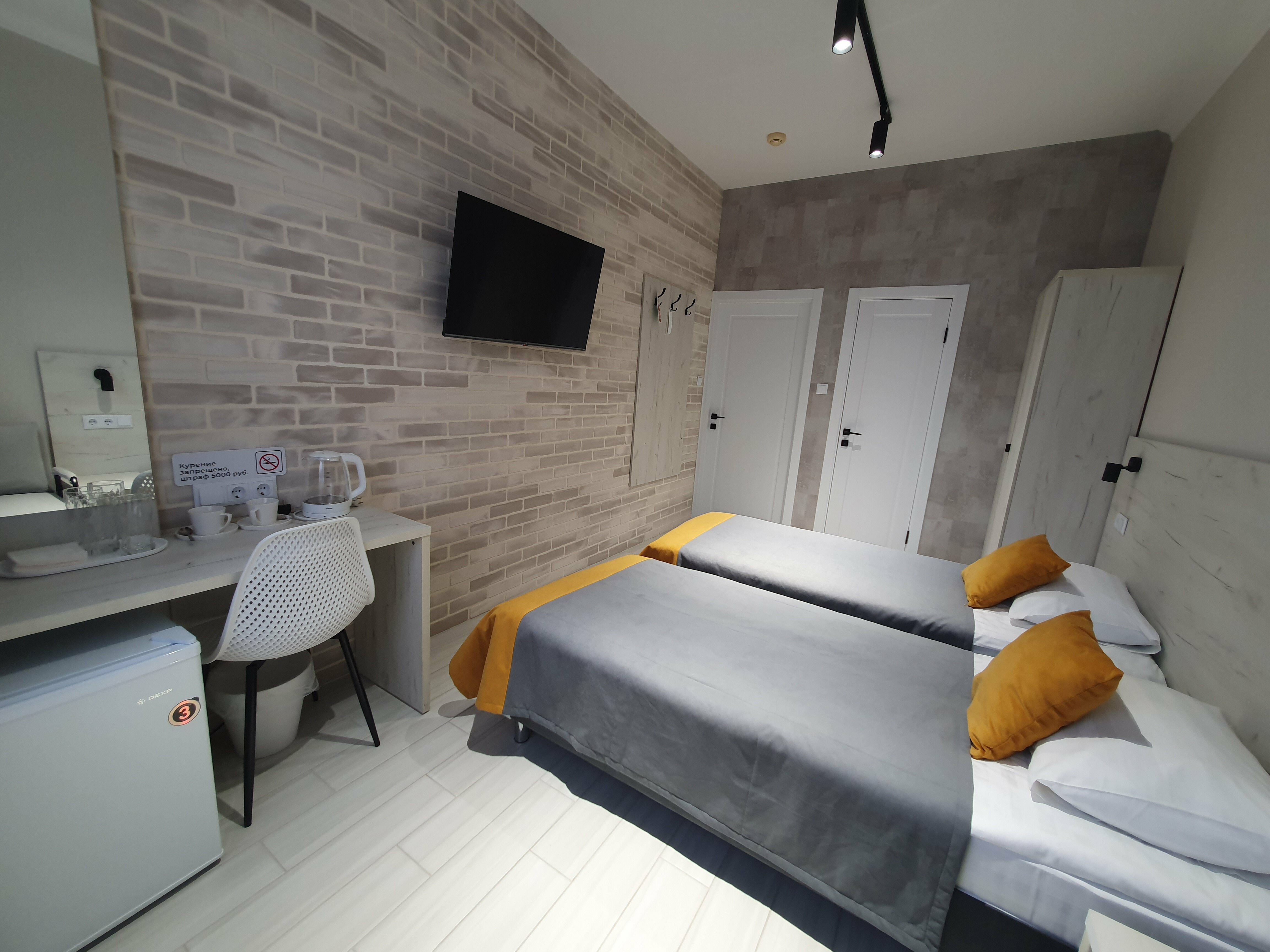 Улучшенный двухместный номер с 2 отдельными кроватями