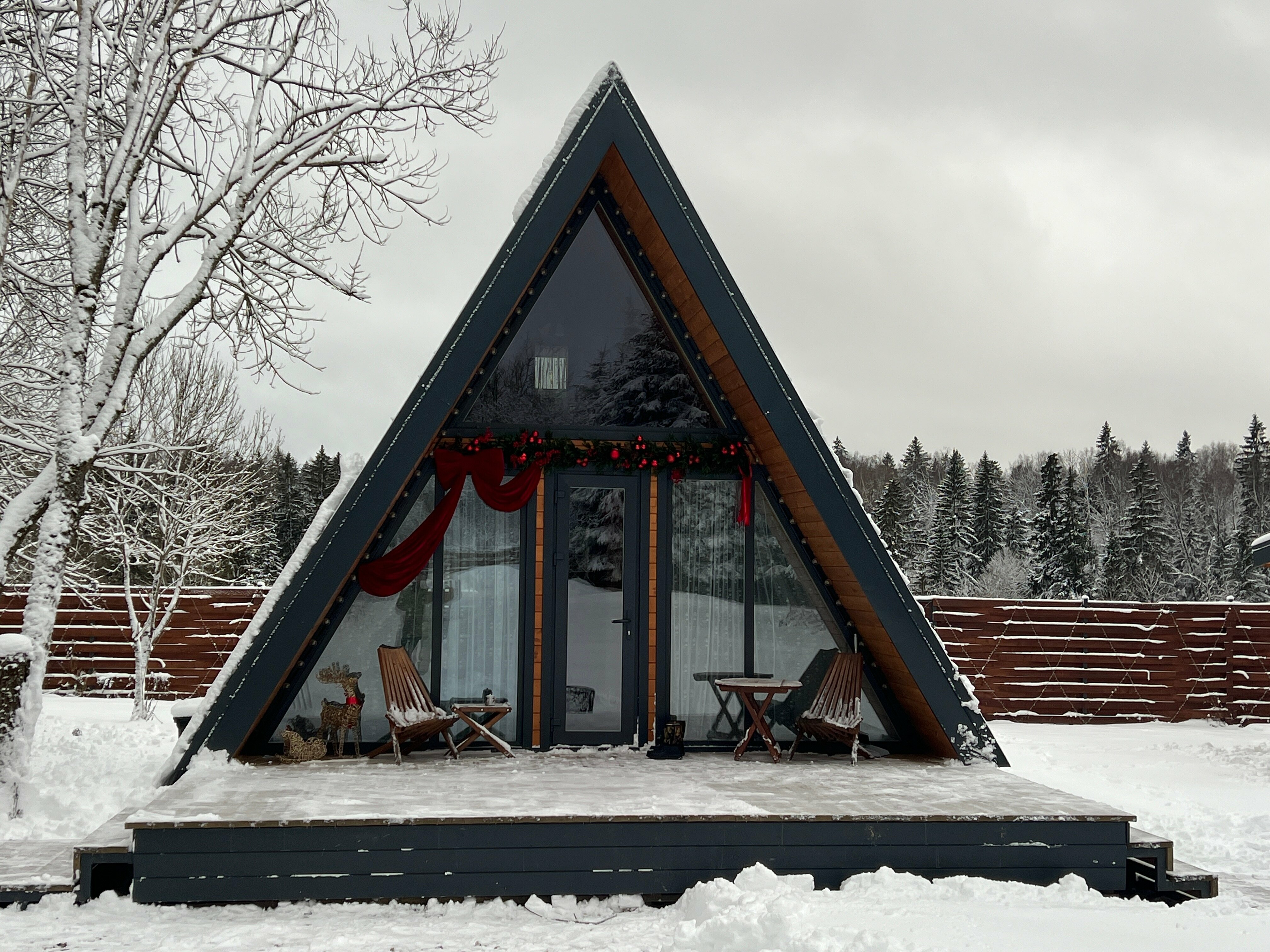 Треугольный дом Путешественник