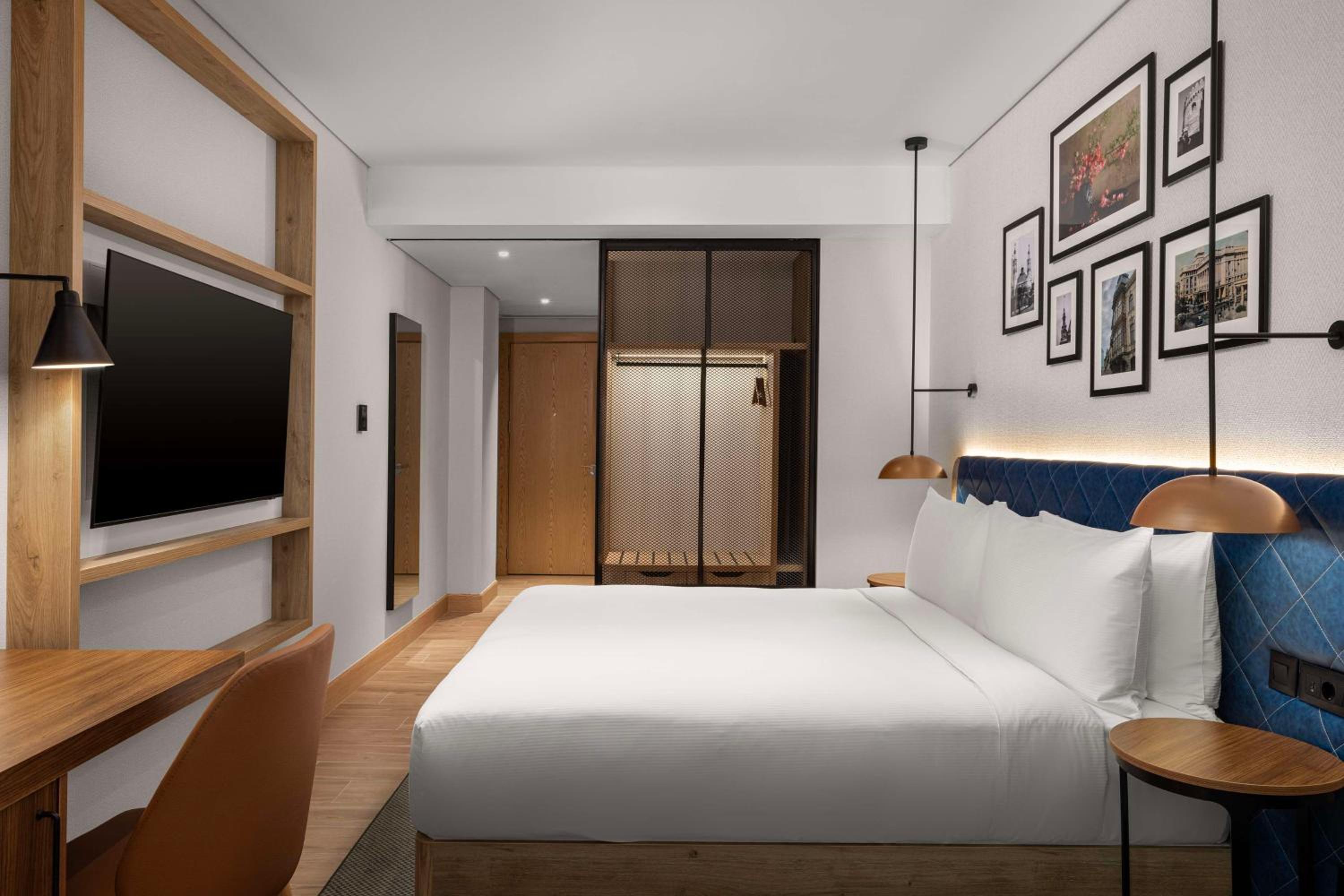 King Room with Sofa Bed - Atrium View