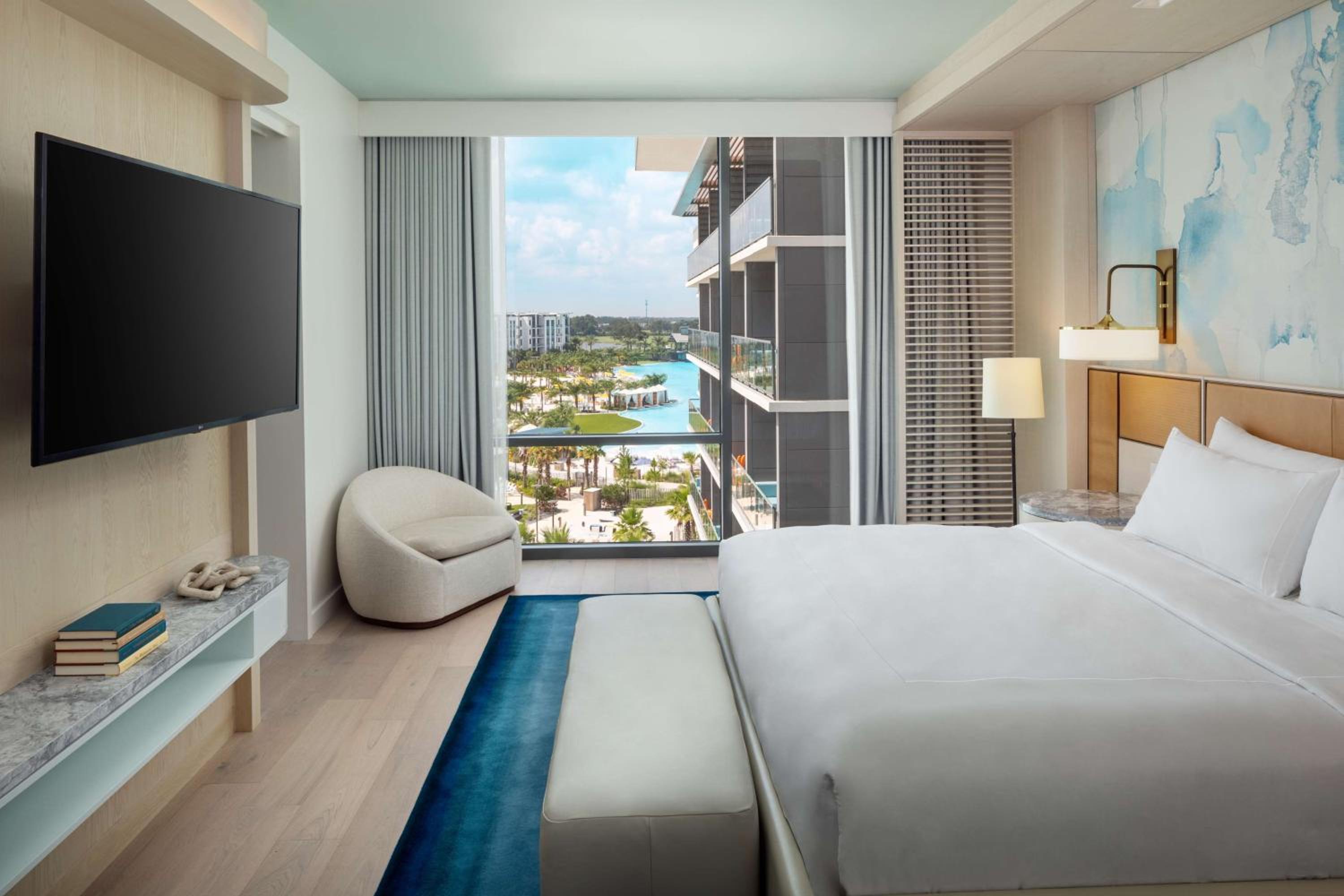 One-Bedroom Suite with Balcony and Pool View