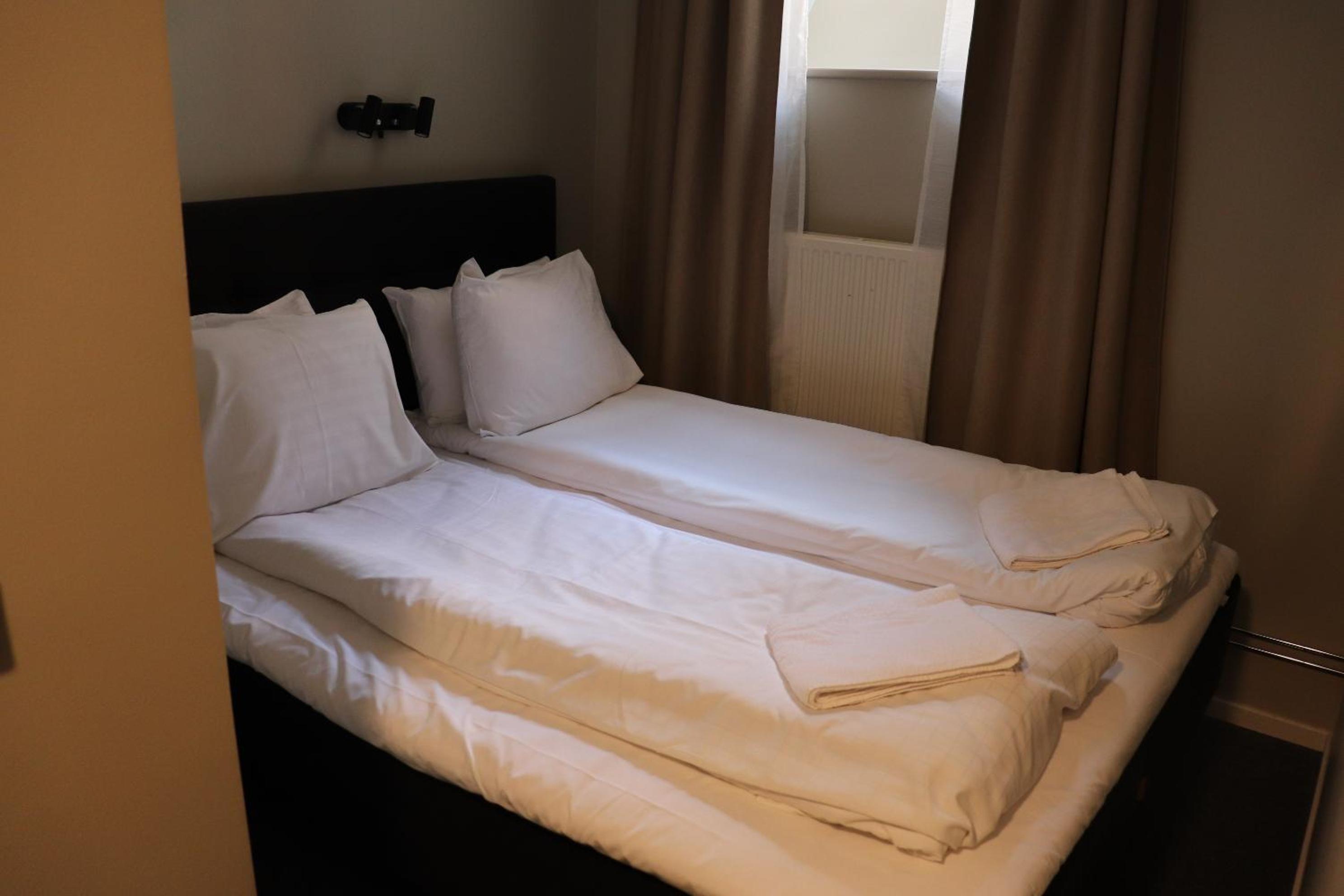 Economy Queen Room with No Window - Non-Smoking