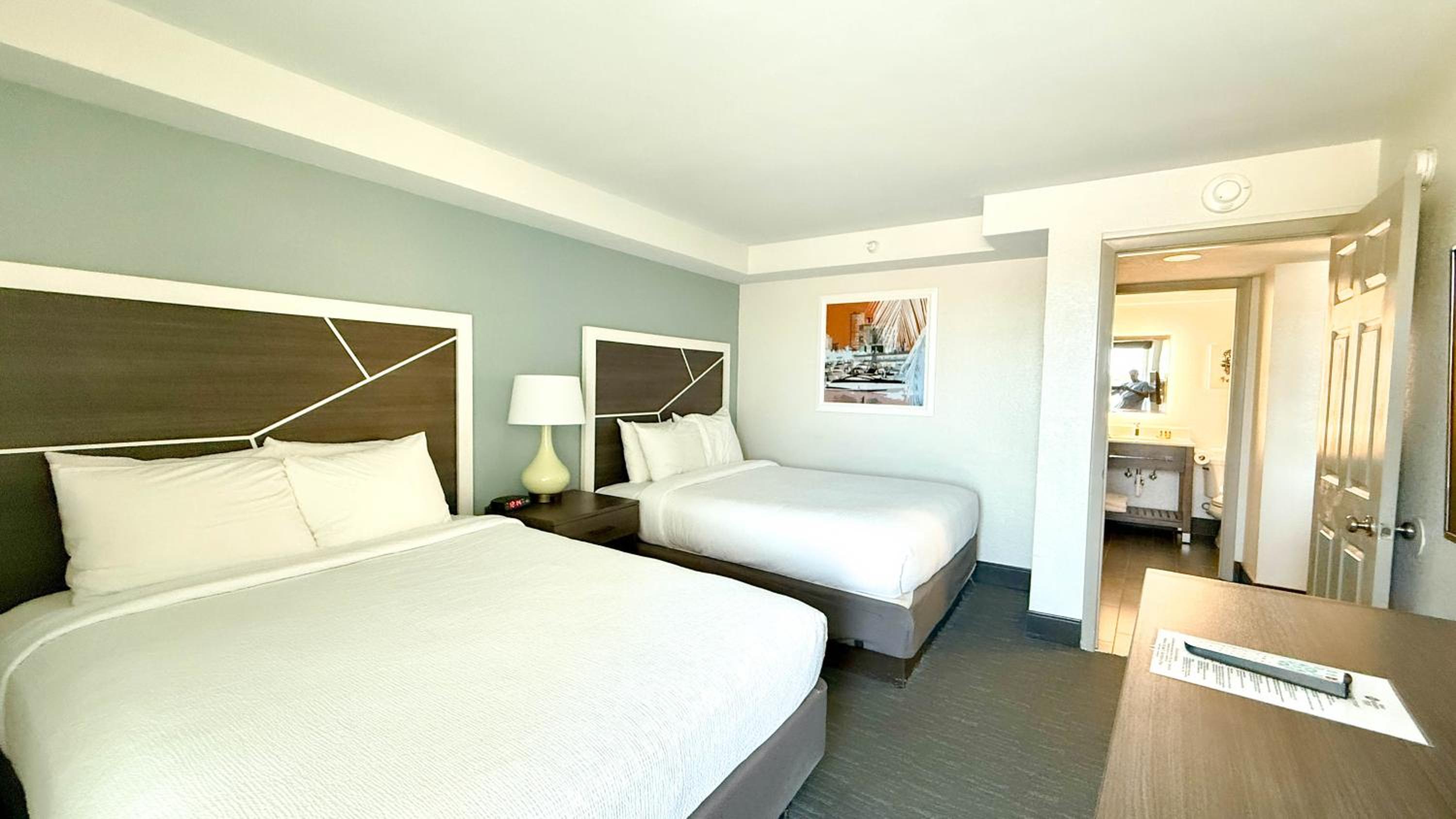 Two-Room Queen Suite with Two Queen Beds, Sofa Bed, Balcony, Partial Ocean View and Kitchenette - Non-Smoking