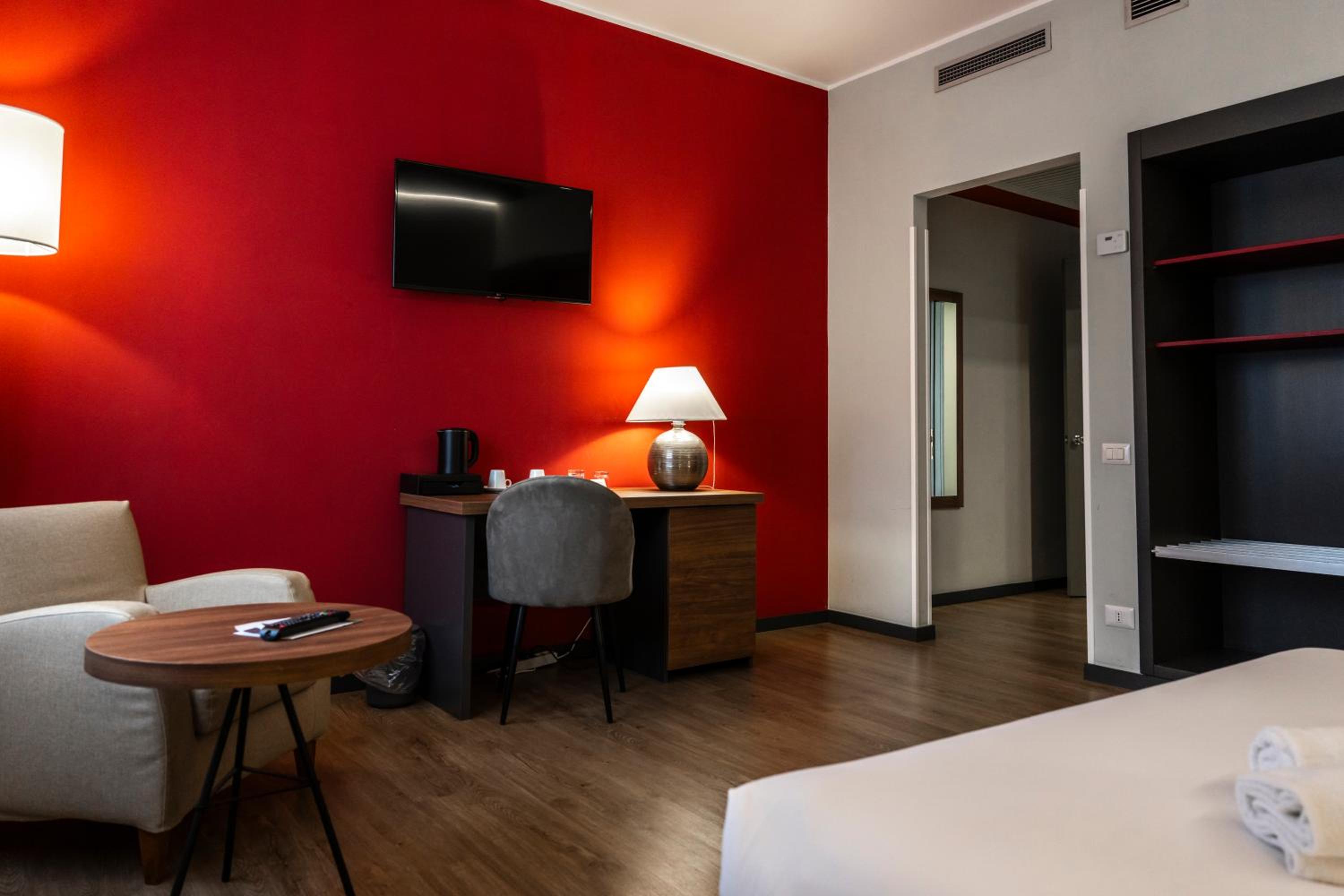 Superior Room with One Double Bed, One Single Bed and Sofa Bed