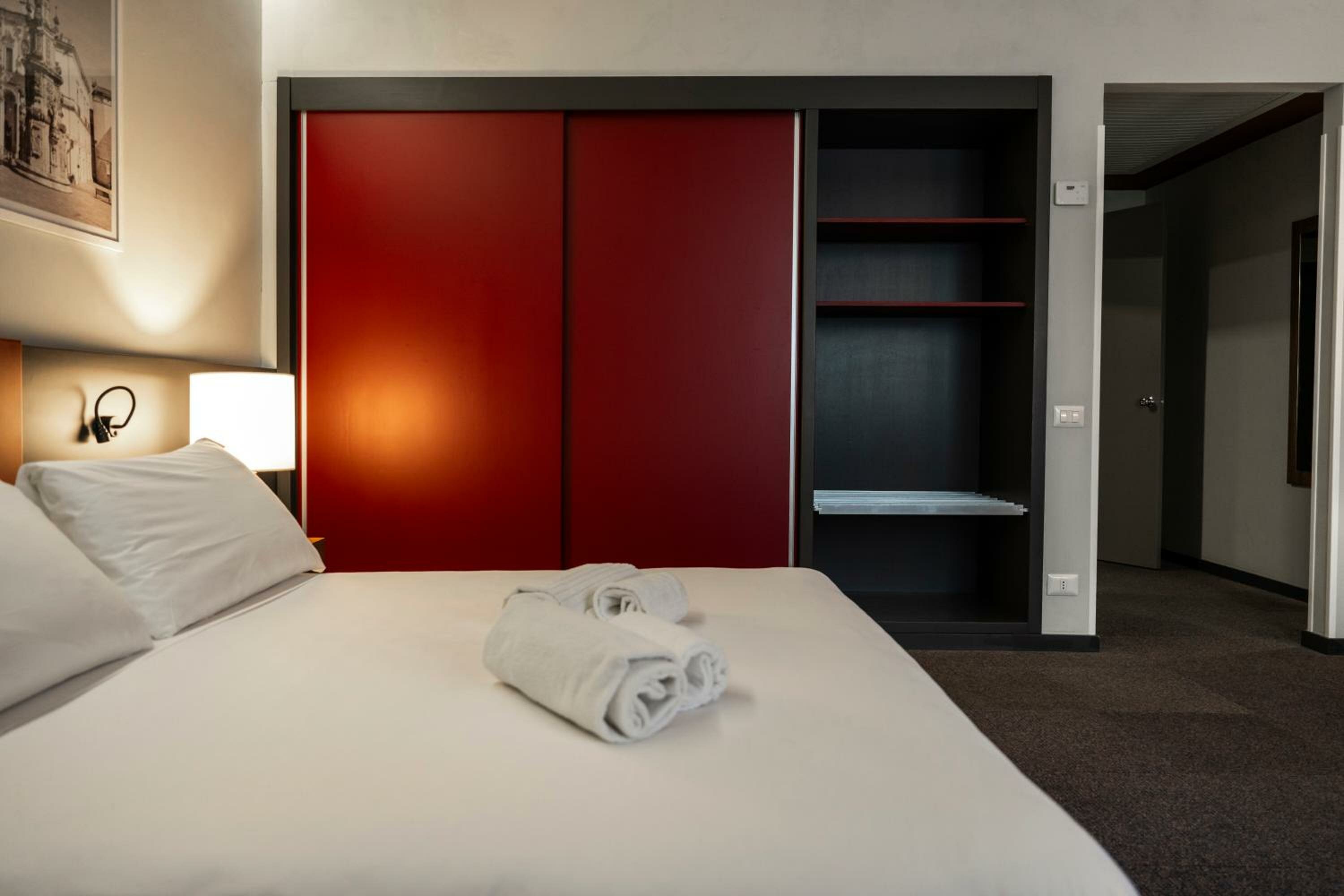 Superior Room with One Double Bed, One Single Bed and Sofa Bed