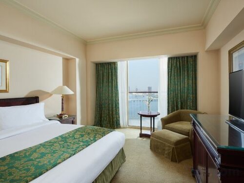 King Corner One Bedroom Suite With Nile View в Hilton Cairo Grand Nile