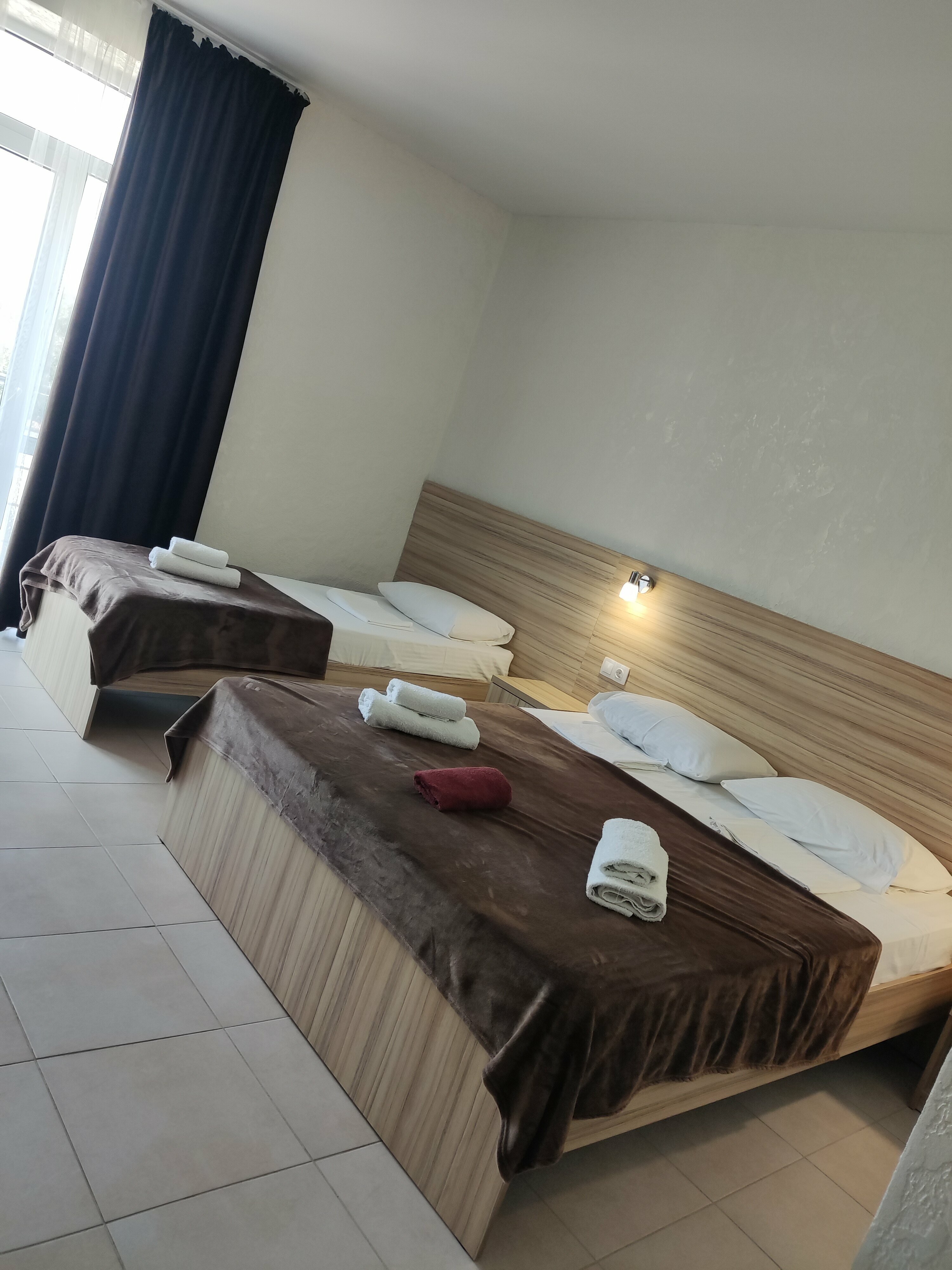 Трехместный номер с балконом