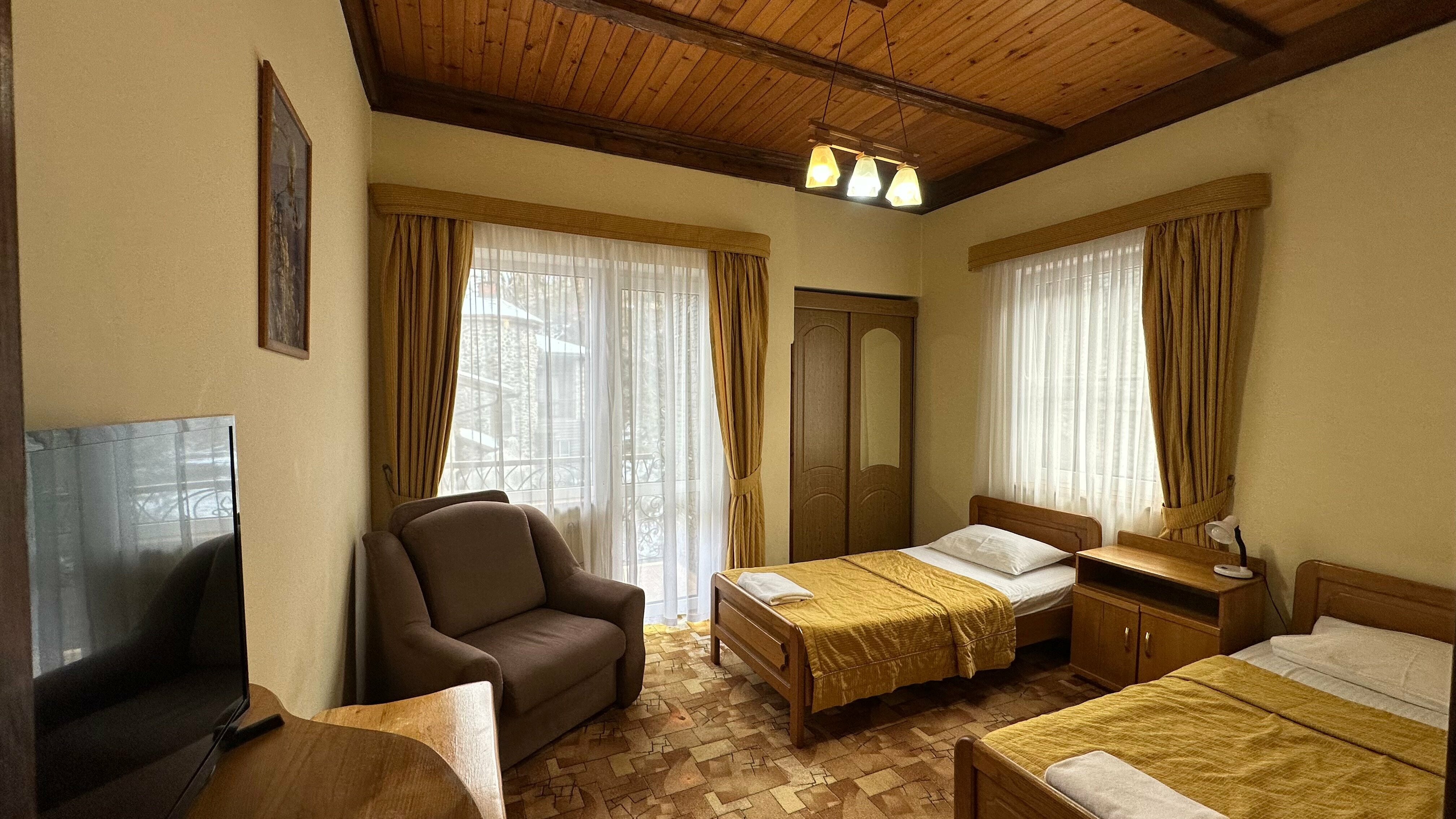 Двухместный номер с 2 отдельными кроватями и балконом