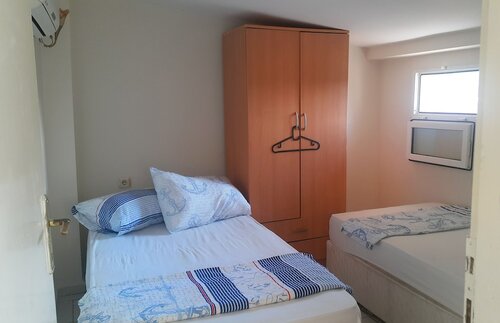 Номер с 2 односпальными кроватями, 1 спальня в Oludeniz Hostel