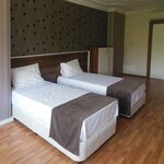 Семейный четырехместный номер в Grand Antalya Hotel