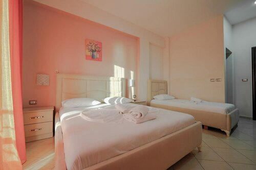 Стандартный трехместный номер в Unico ApartHotel