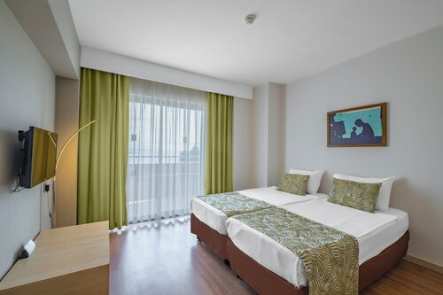 Семейный четырехместный номер в A Good Life Utopia Family Resort