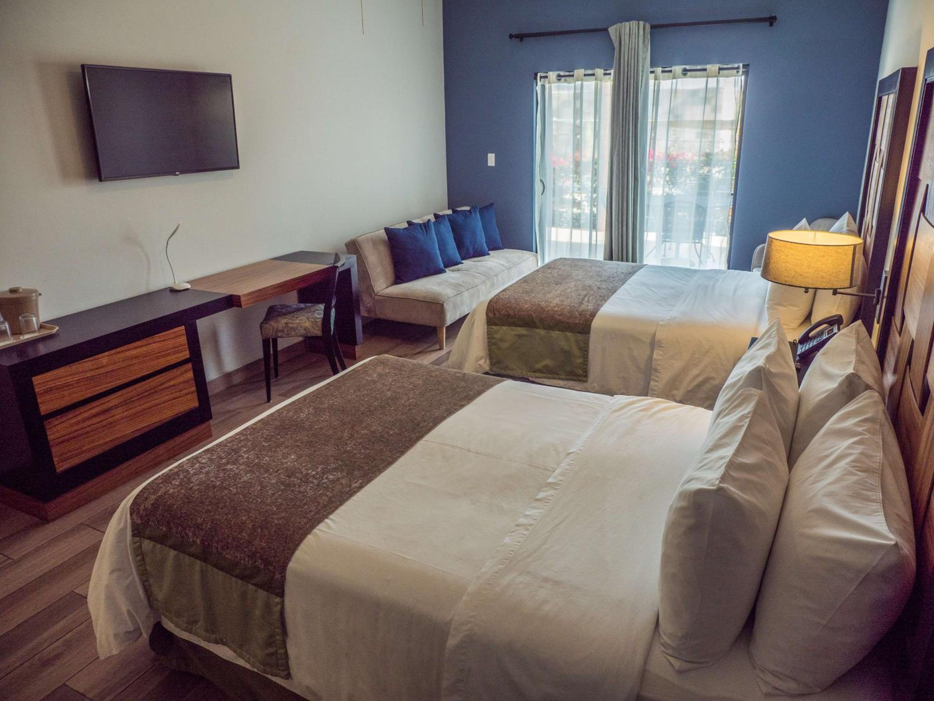 Double Suite with Two Double Beds with Sofa Bed
