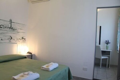 Четырехместный номер в Hotel Cala di Seta