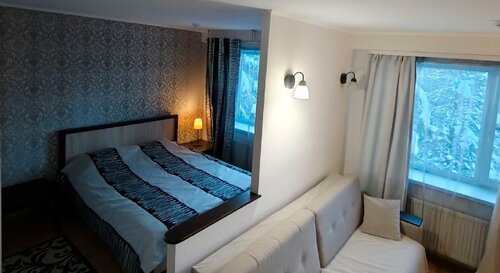 Номер Люкс с большой кроватью и диваном