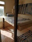 Общее спальное помещение, только для женщин, вид на бассейн (Air conditioning) в Oludeniz Hostel