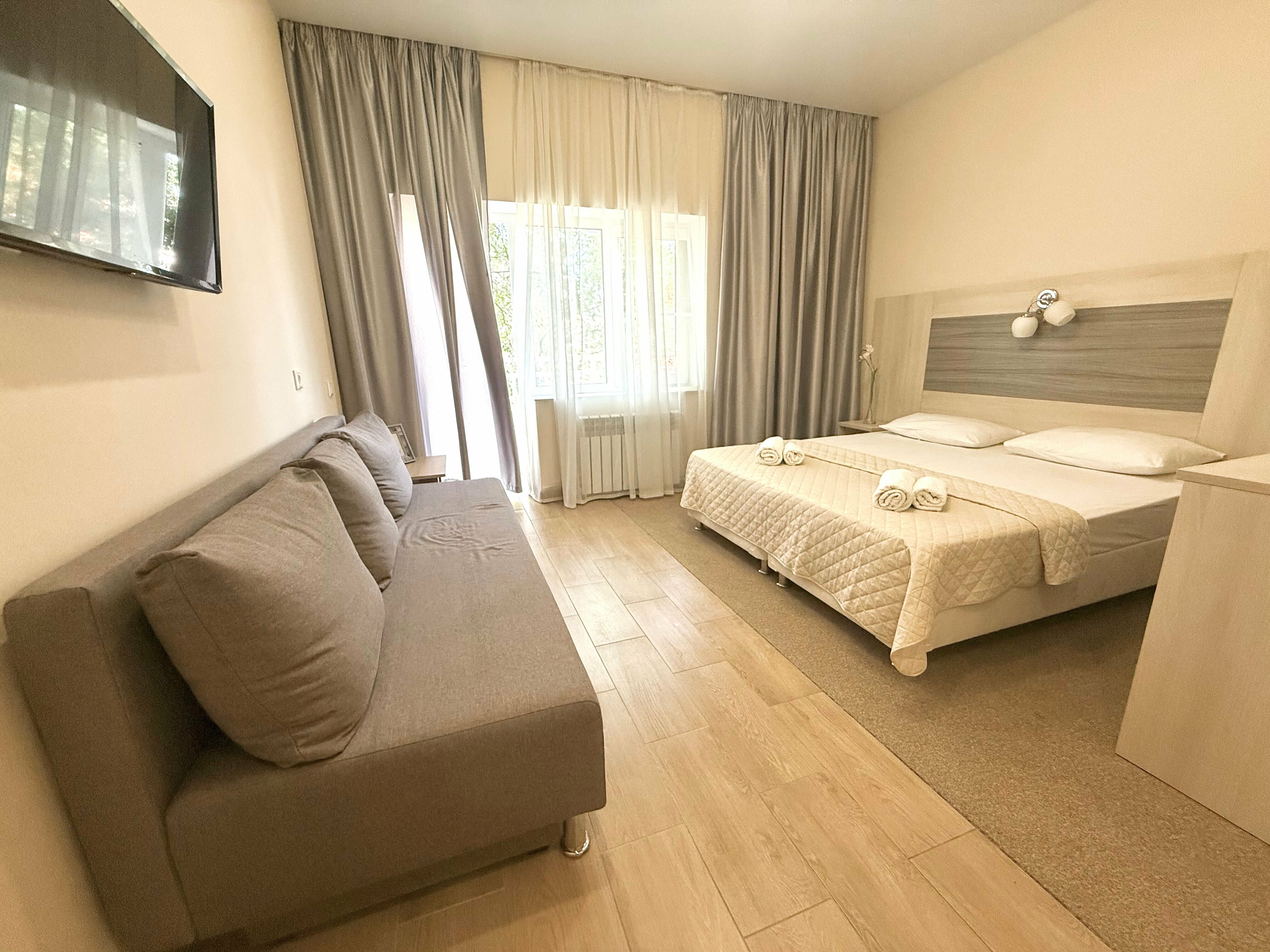 Улучшенный четырехместный номер