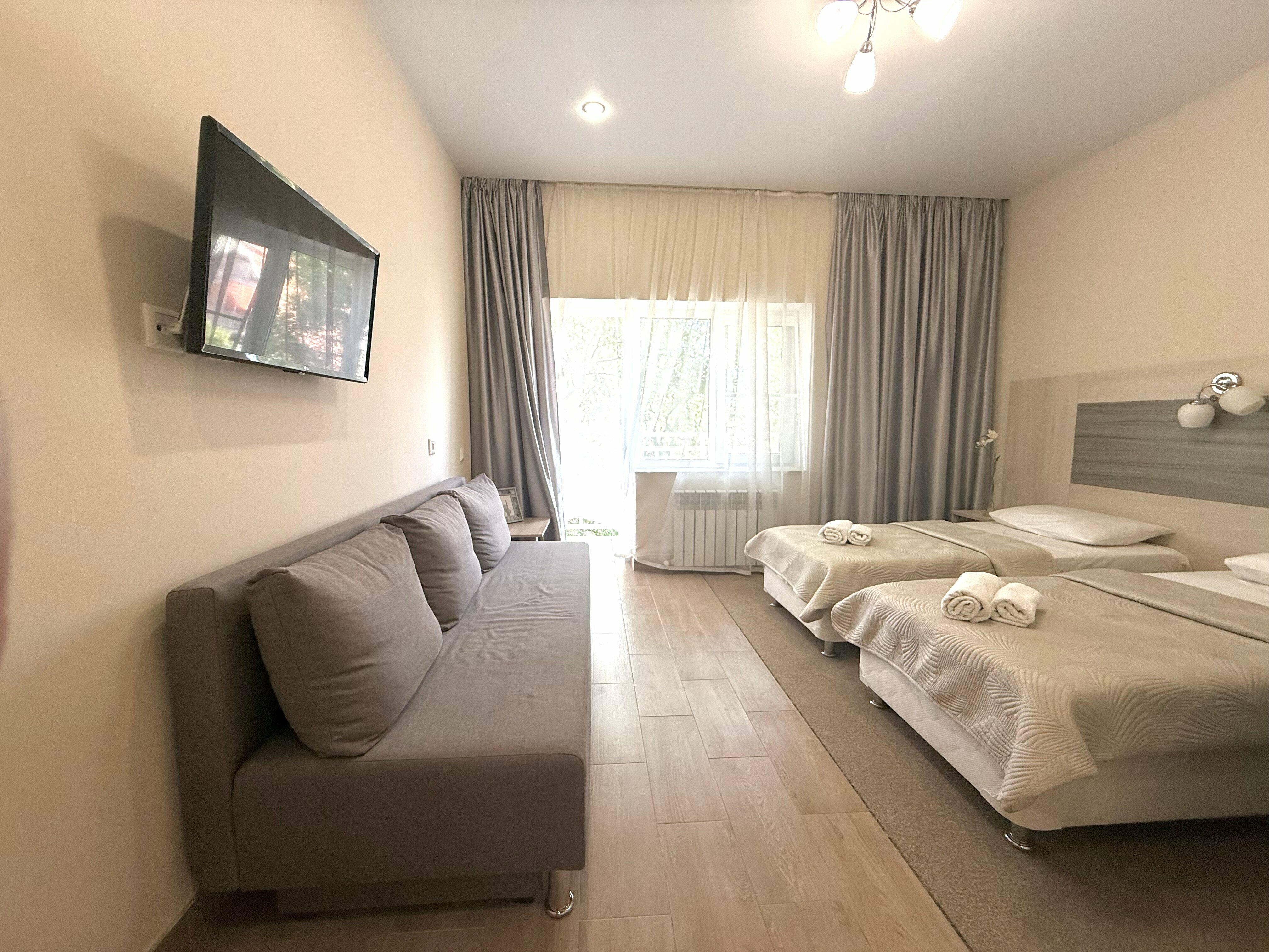 Четырехместный номер Делюкс