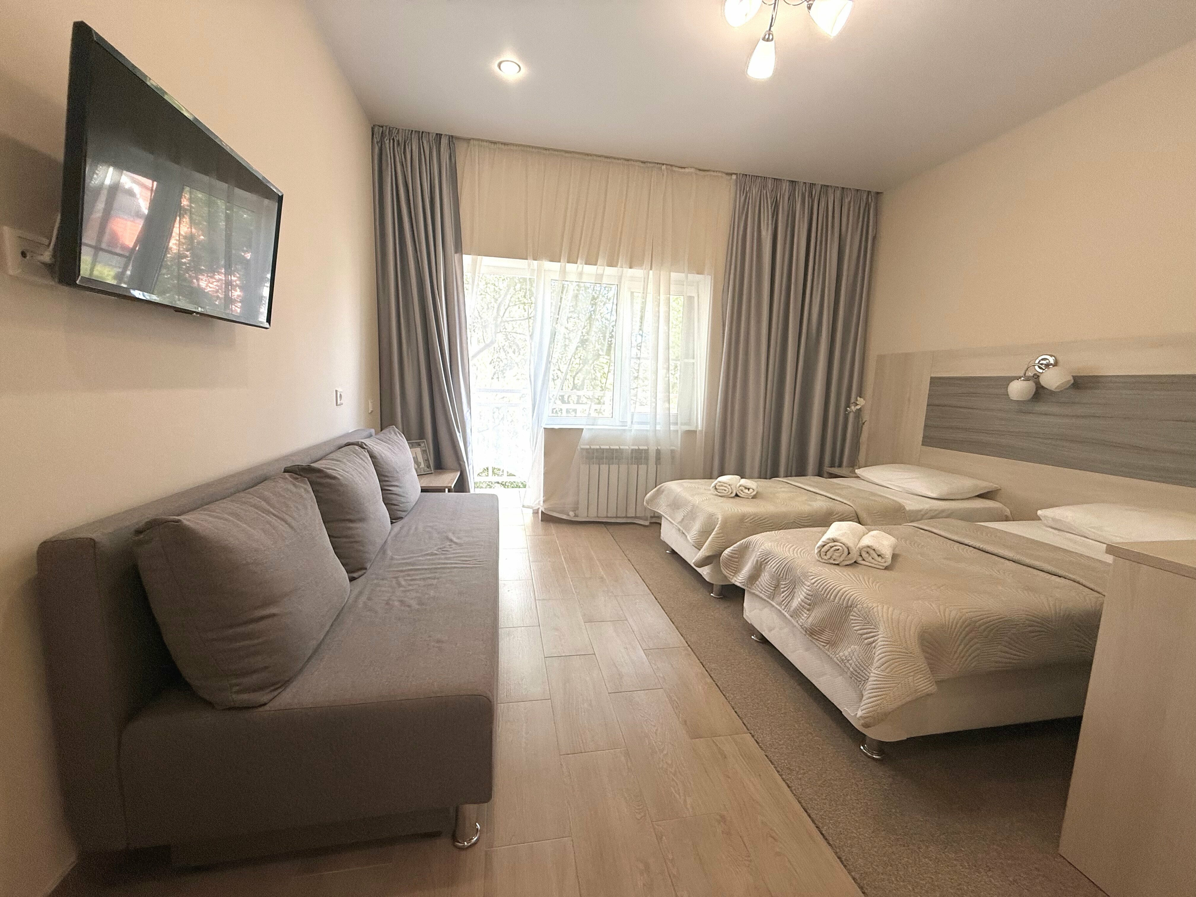 Улучшенный четырехместный номер