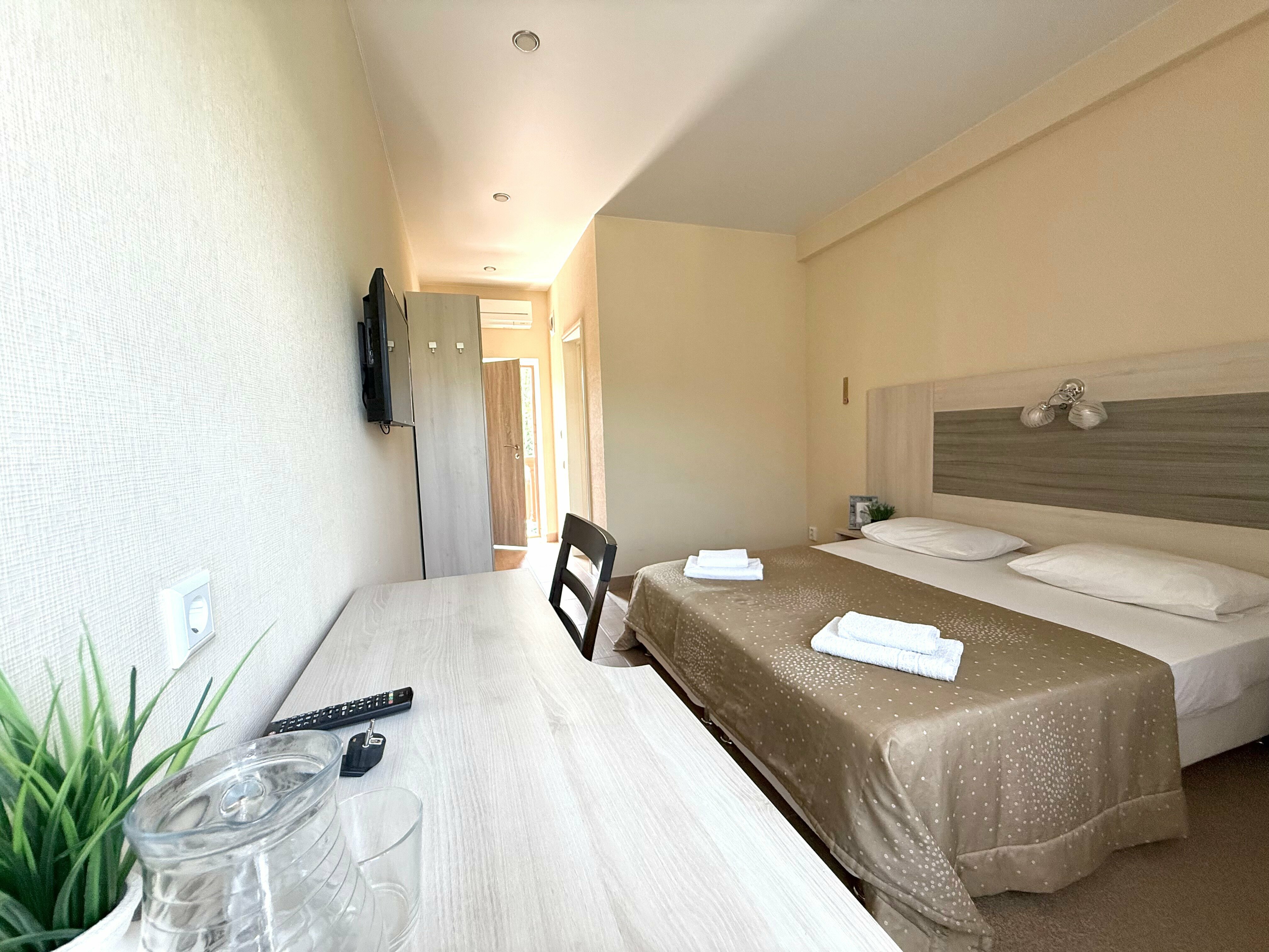 Улучшенный номер с кроватью размера «king-size» или 2 отдельными кроватями