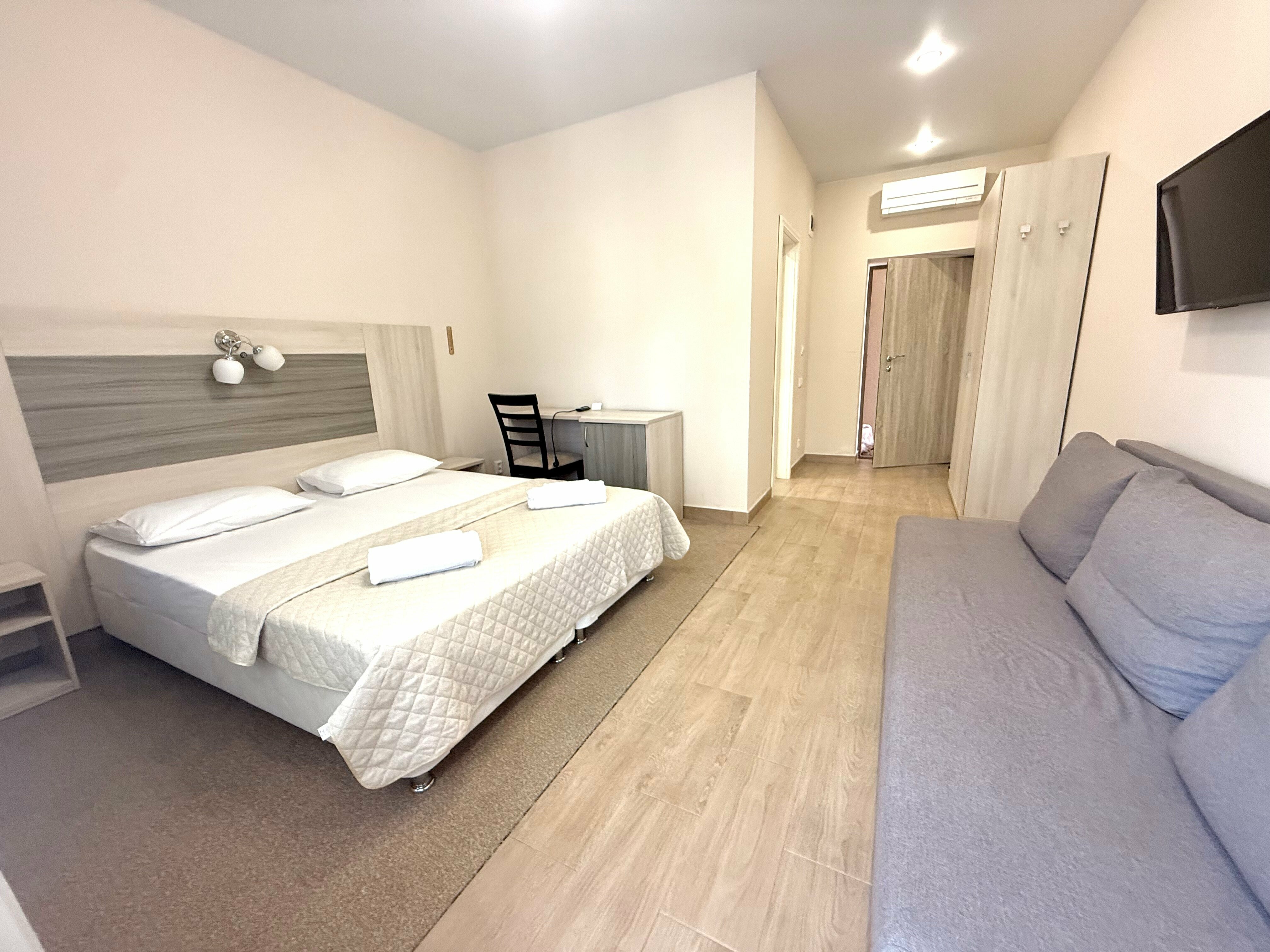 Четырехместный номер Делюкс