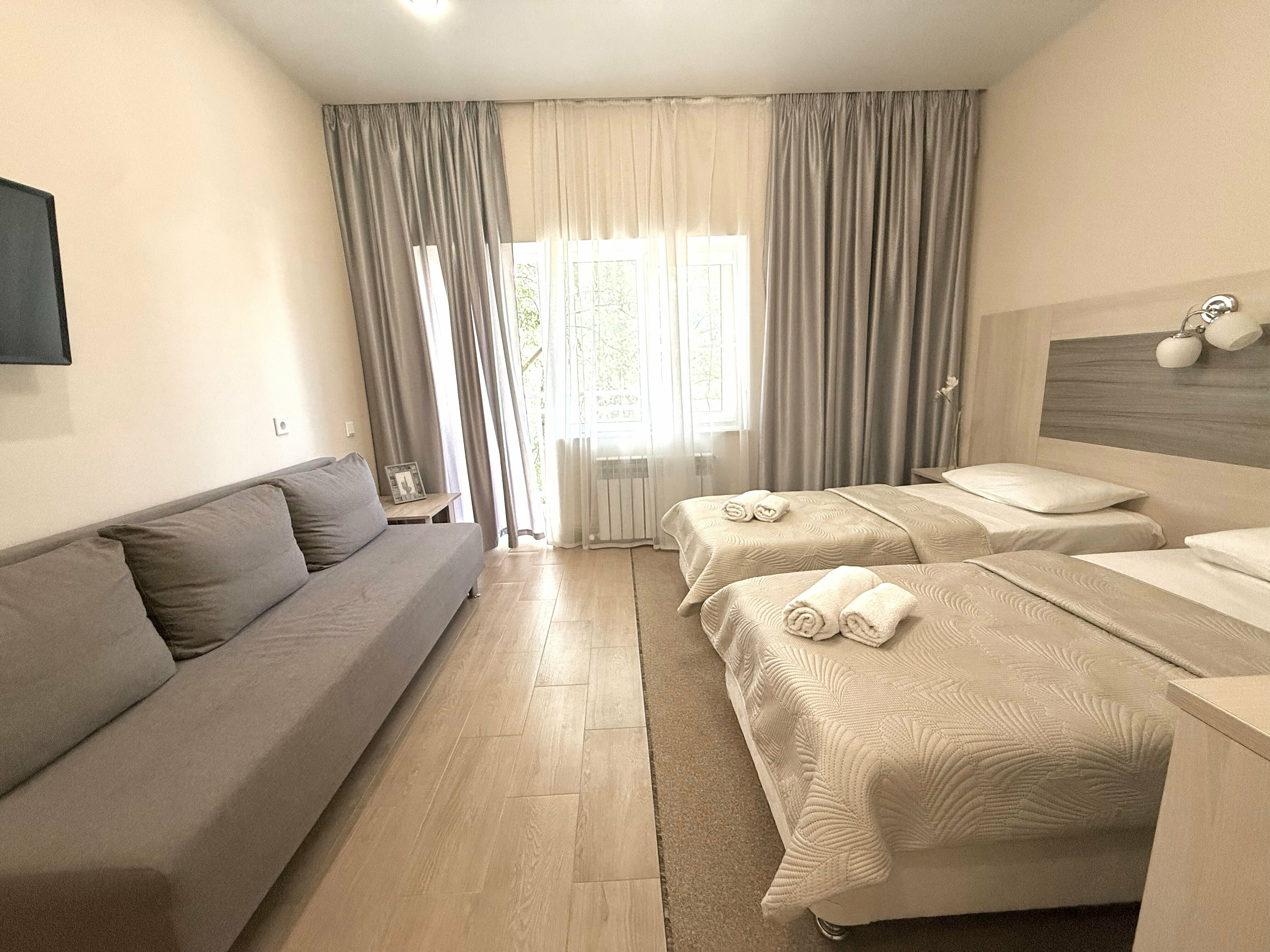 Четырехместный номер Делюкс