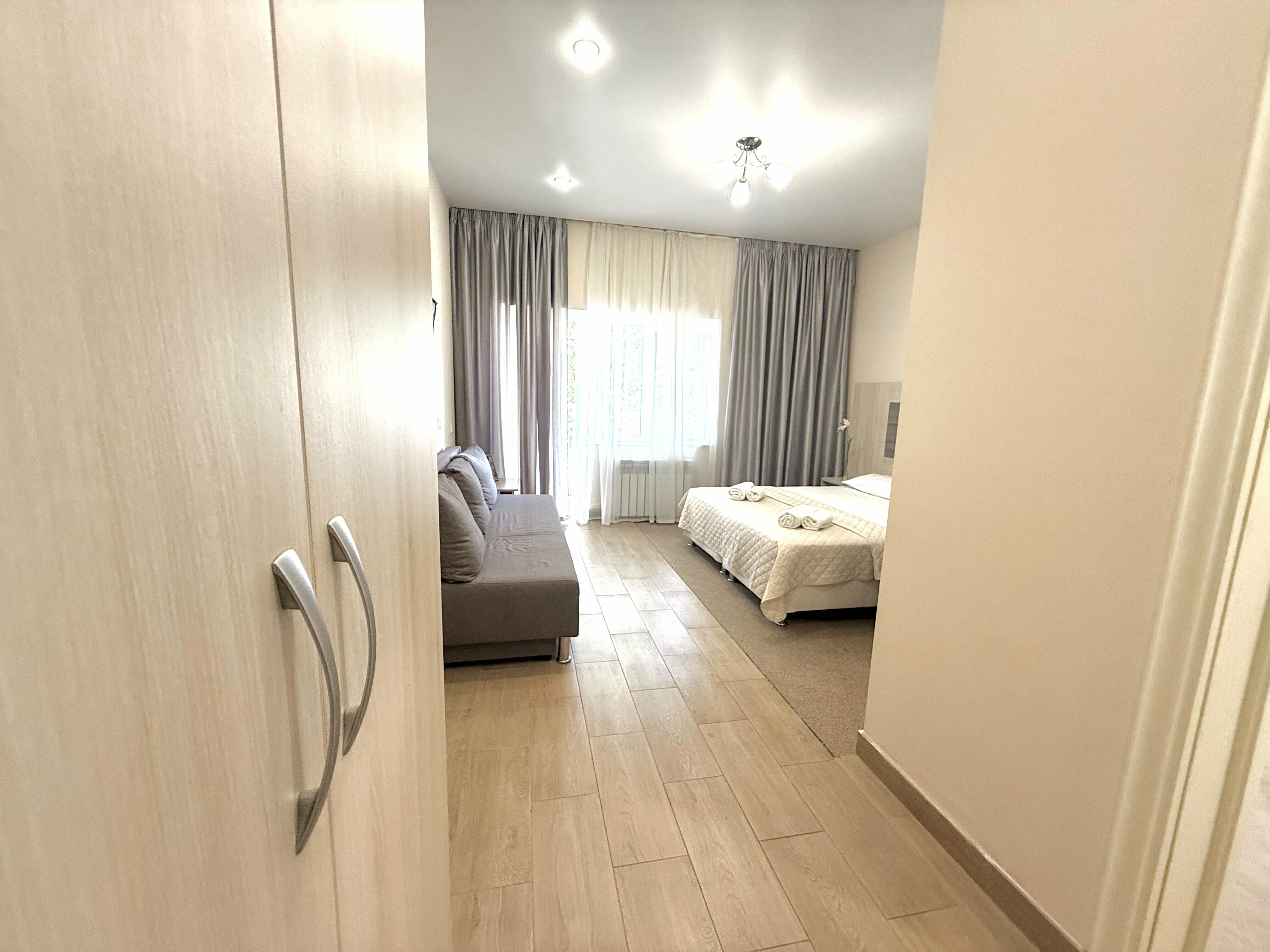 Четырехместный номер Делюкс