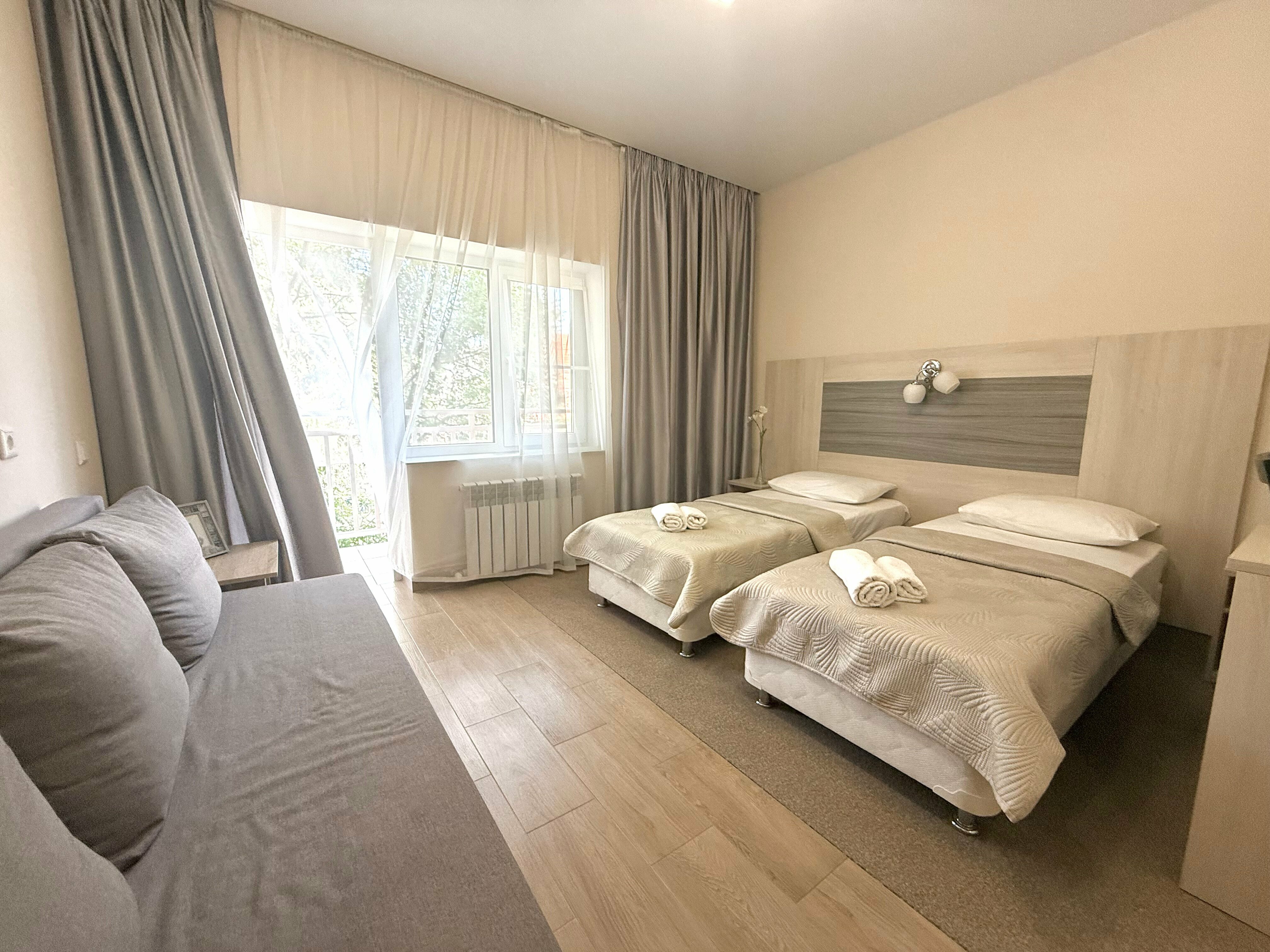 Улучшенный четырехместный номер