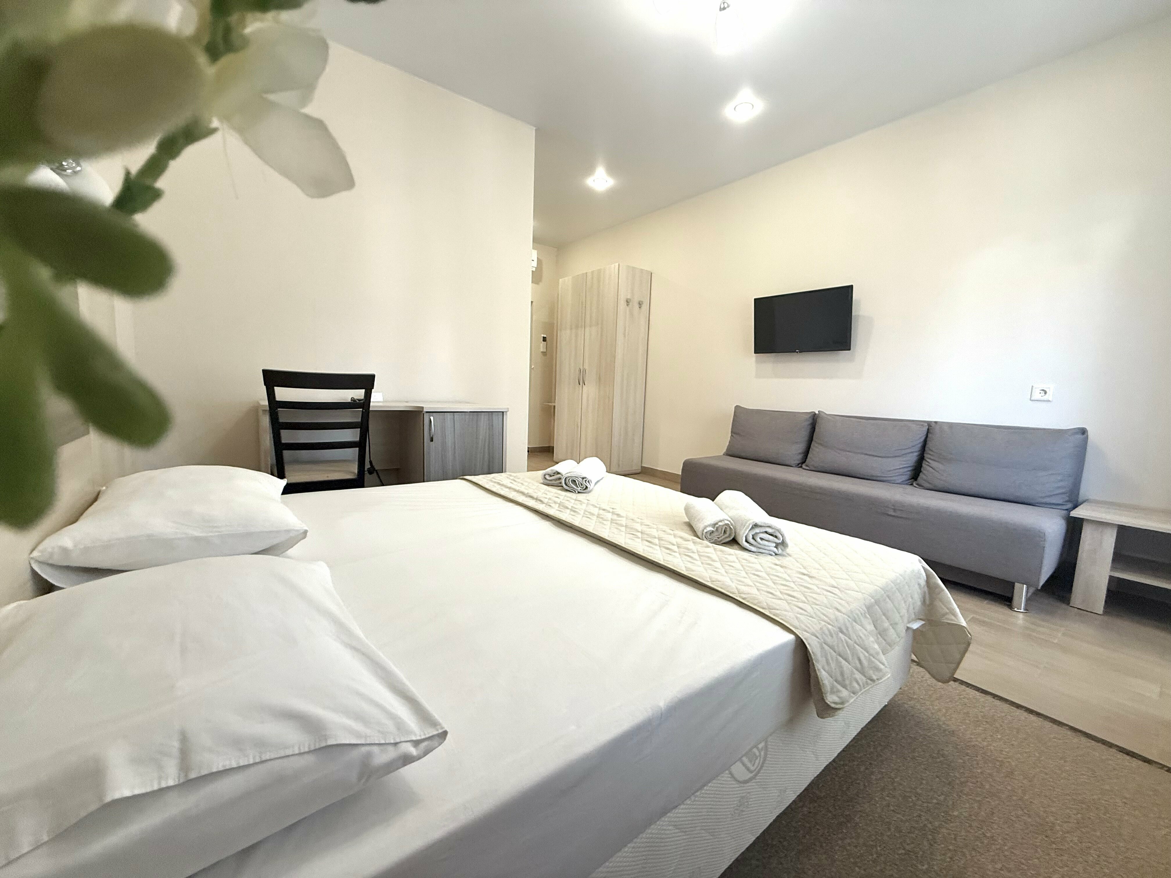 Четырехместный номер Делюкс