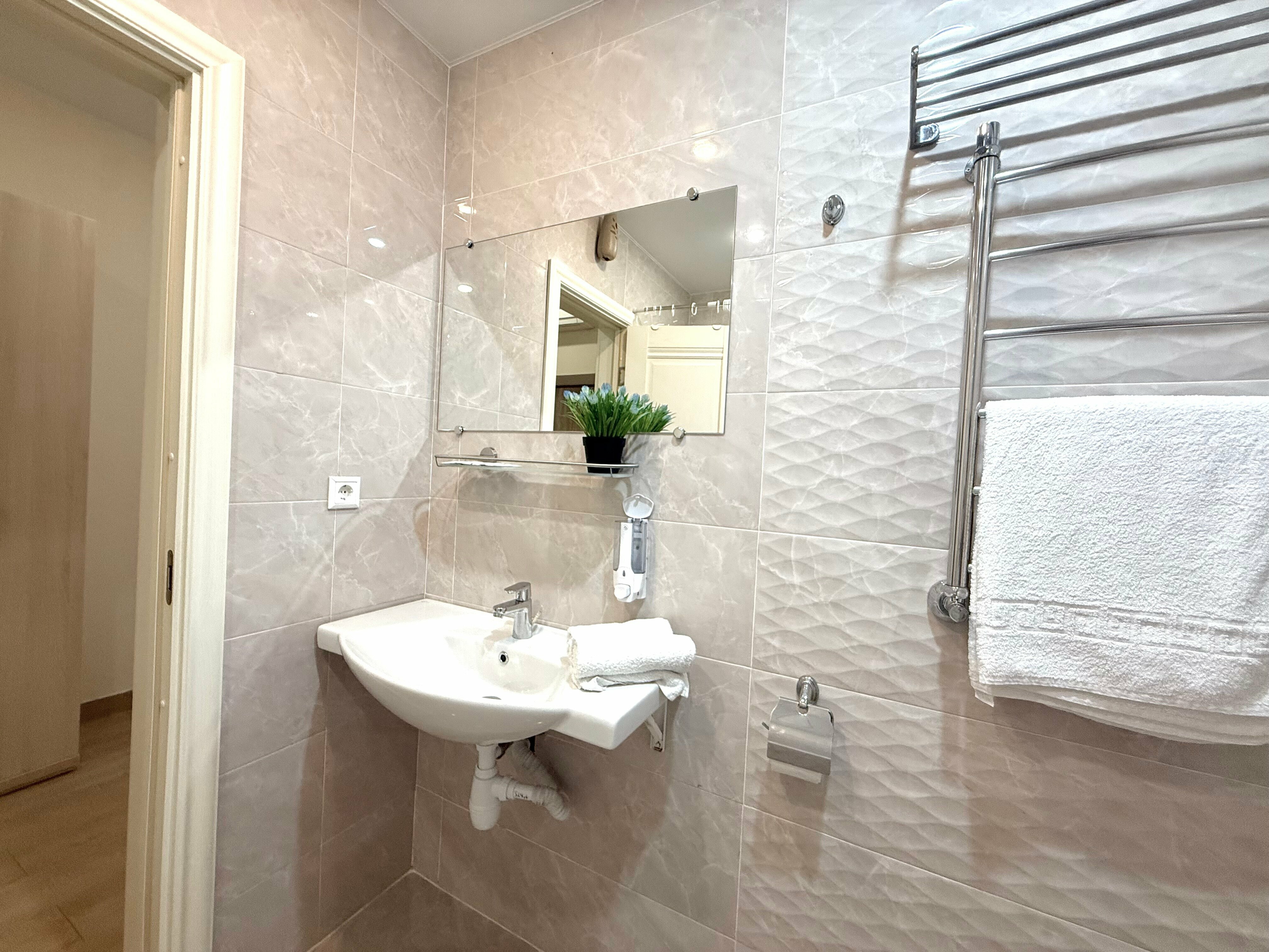 Четырехместный номер Делюкс