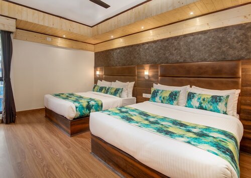Семейный четырехместный номер в Sumi Queen's Yard Rink Mall Darjeeling