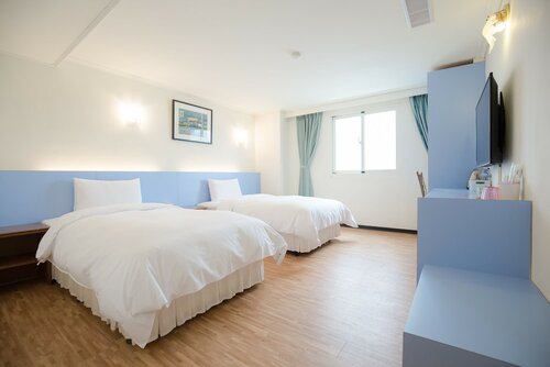 Номер с 2 односпальными кроватями в Apple Hotel