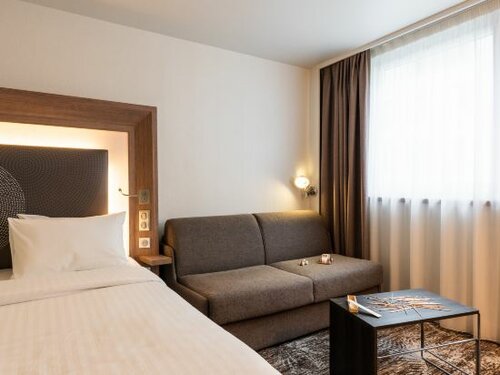 Executive Quadruple Room With Queen Size Bed And Double Sofa Bed в Novotel Paris Gare De Lyon