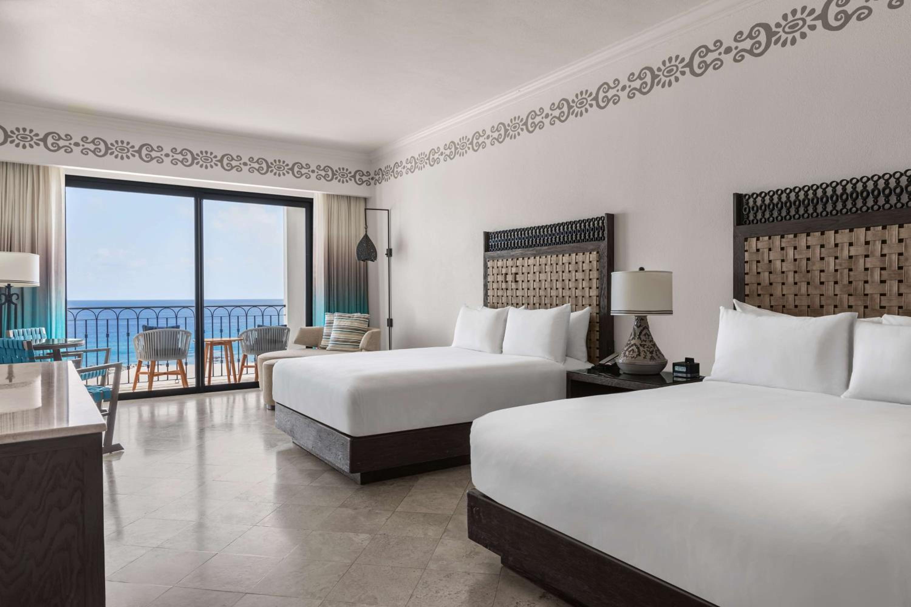 Deluxe Oceanfront Queen Room with Two Queen Beds and Balcony