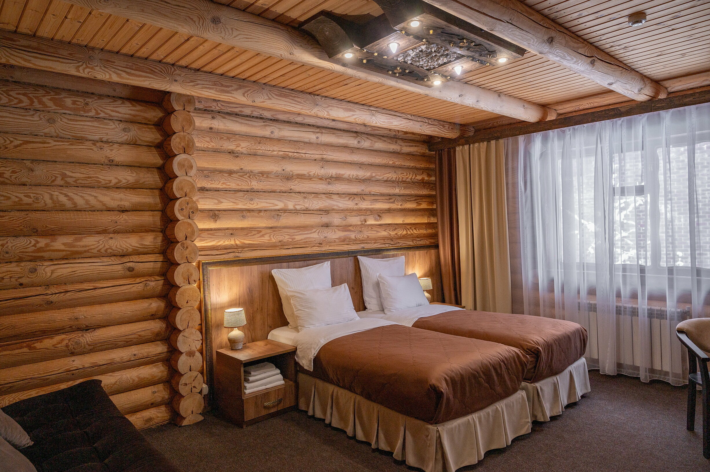 Делюкс с раздельными кроватями и диваном