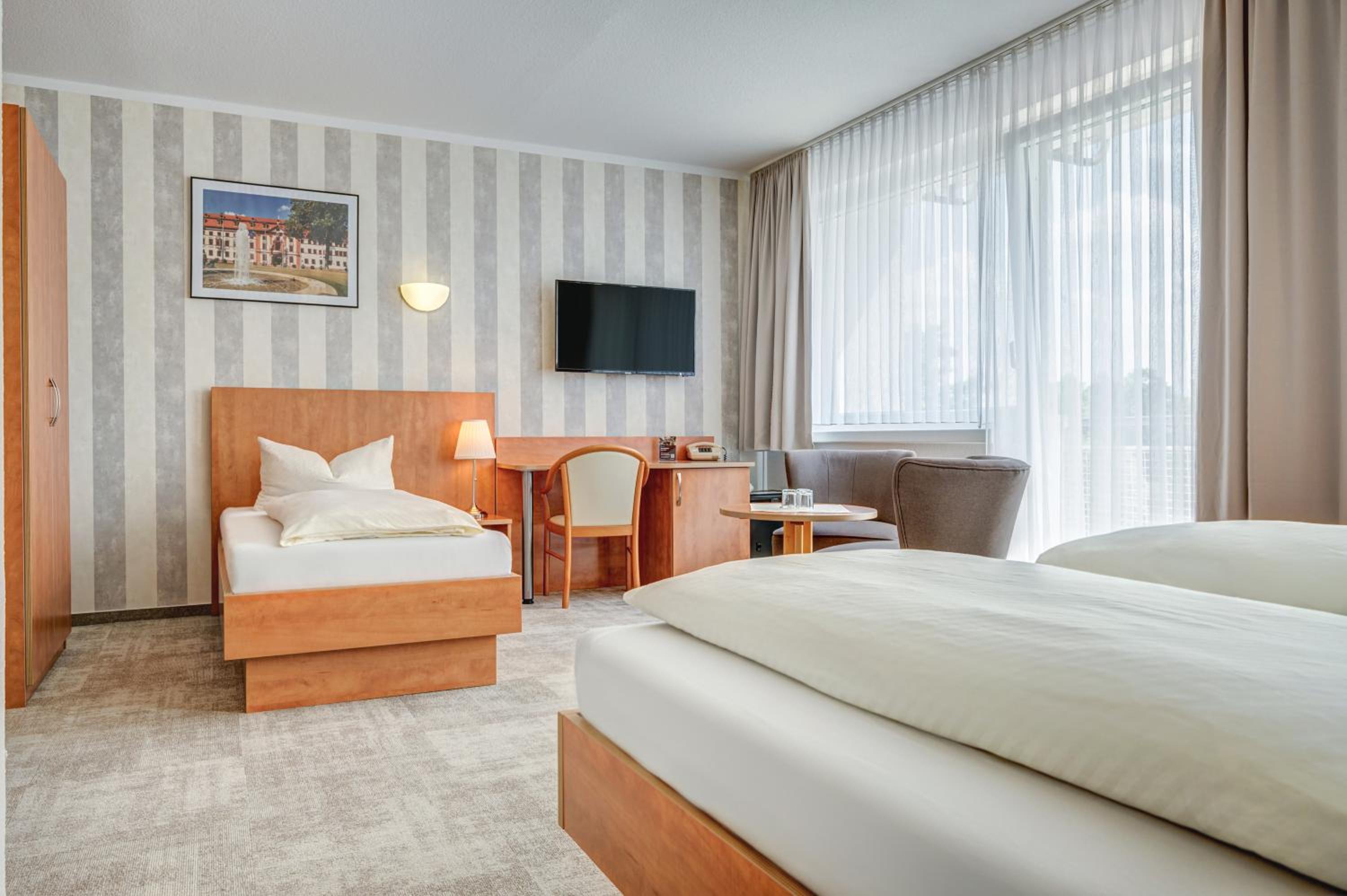 Triple Room (3 Adults or 2 Adults + 1 Child)