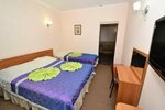 Стандартный трехместный номер в Корона
