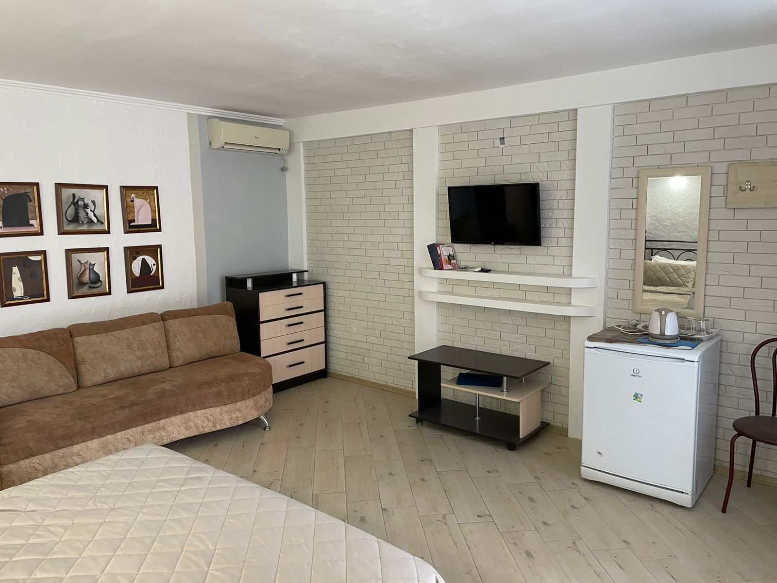 Улучшенный четырехместный номер