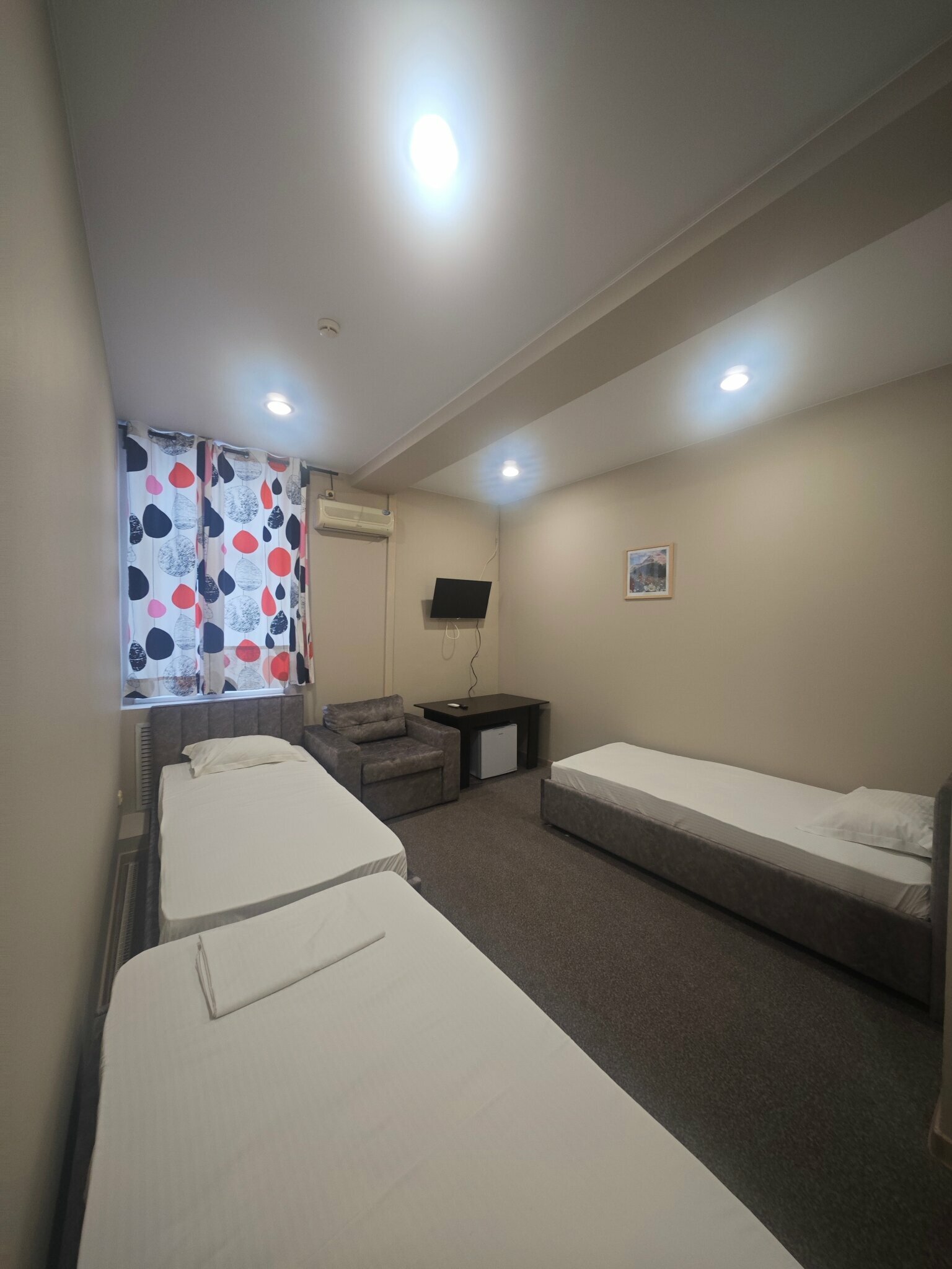 Улучшенный четырехместный номер