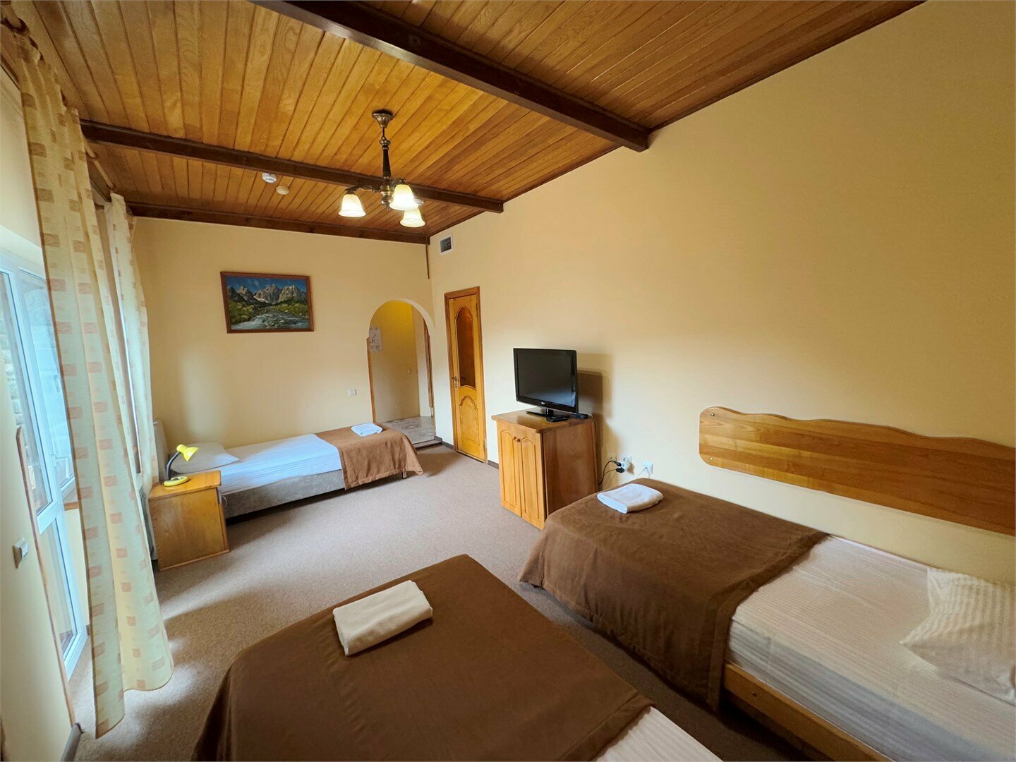 Трехместный номер с балконом