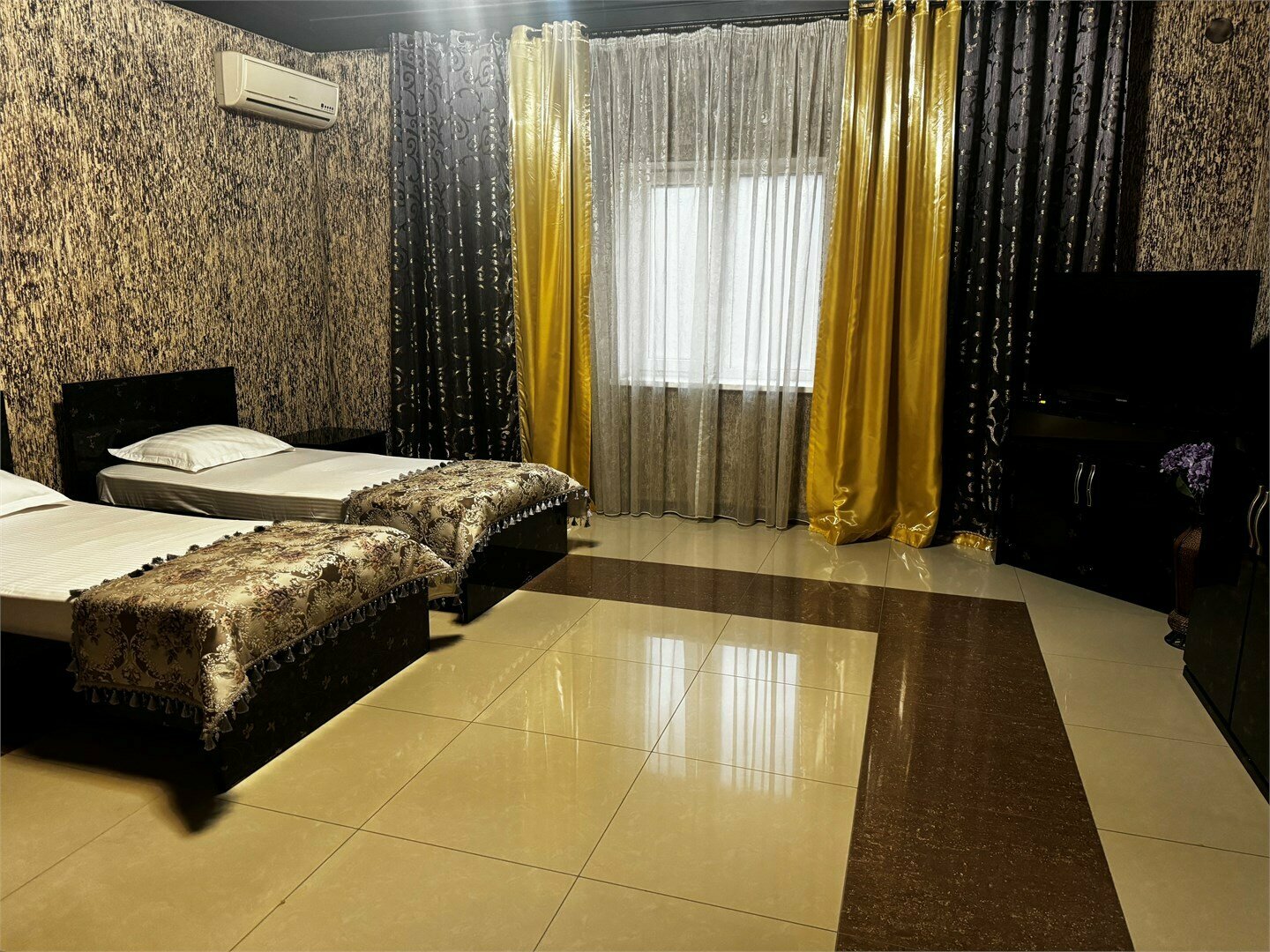 Улучшенный трехместный номер