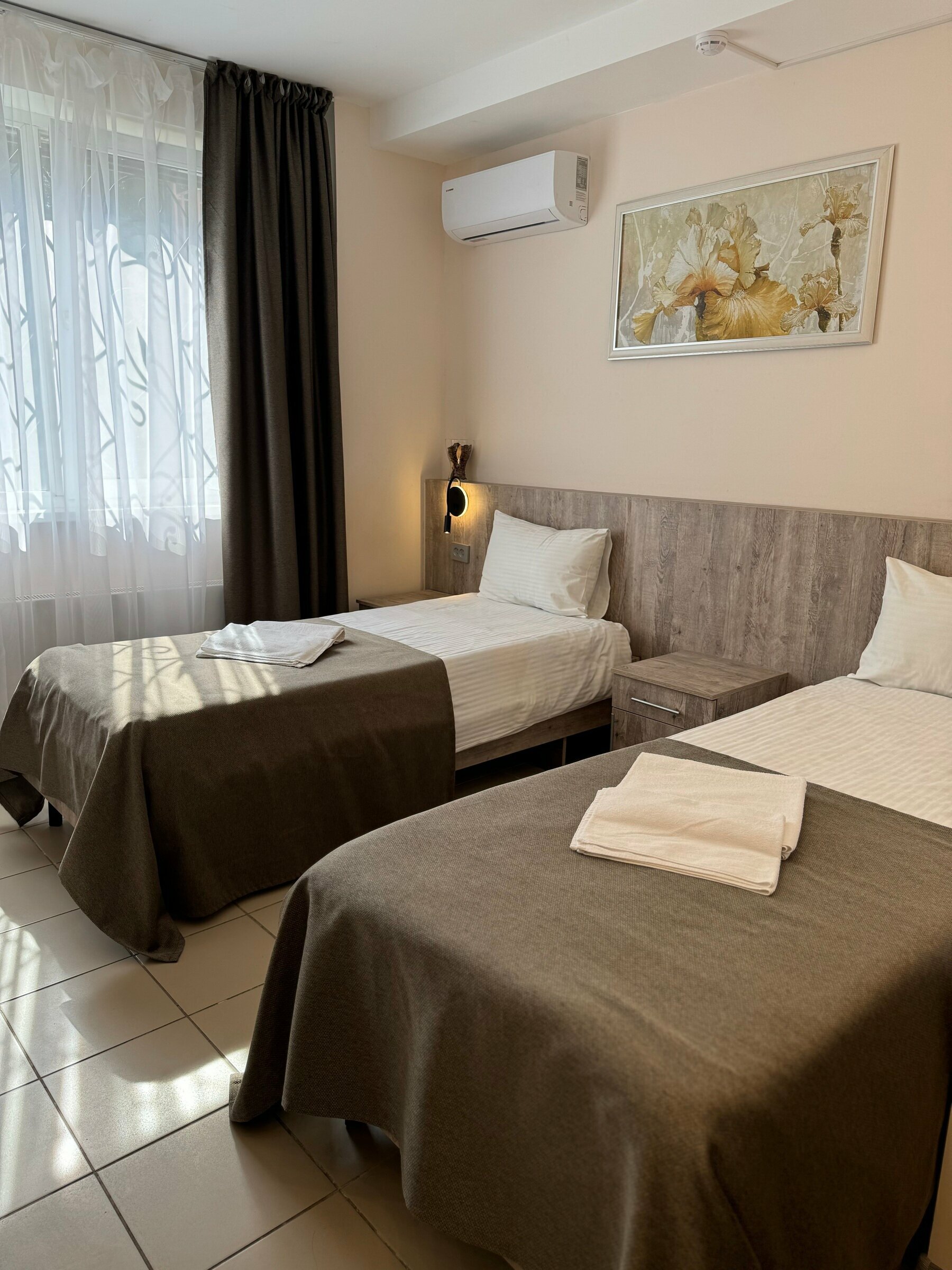 Улучшенный двухместный номер с 2 отдельными кроватями