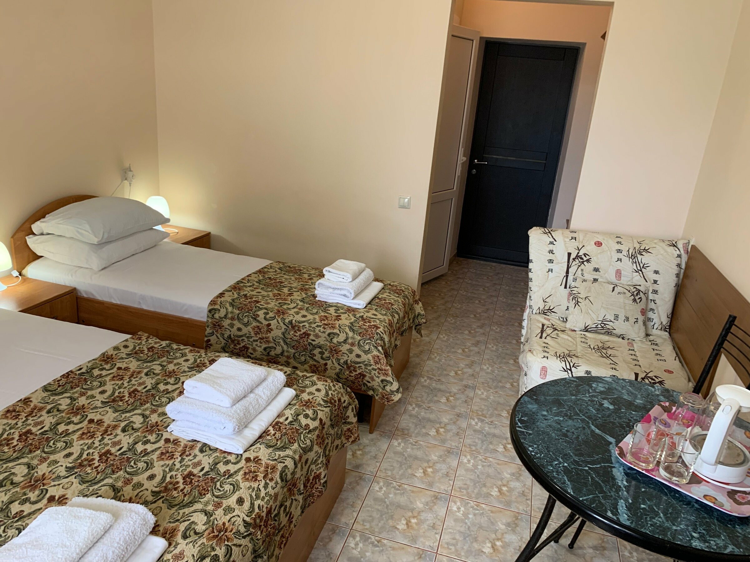 Трехместный номер с балконом