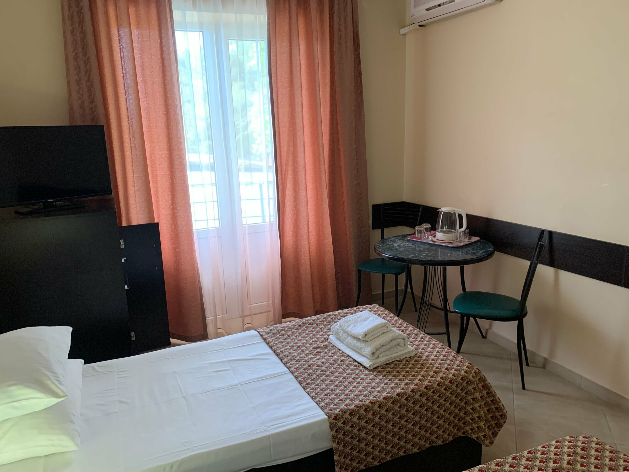 Двухместный номер с 2 отдельными кроватями и балконом