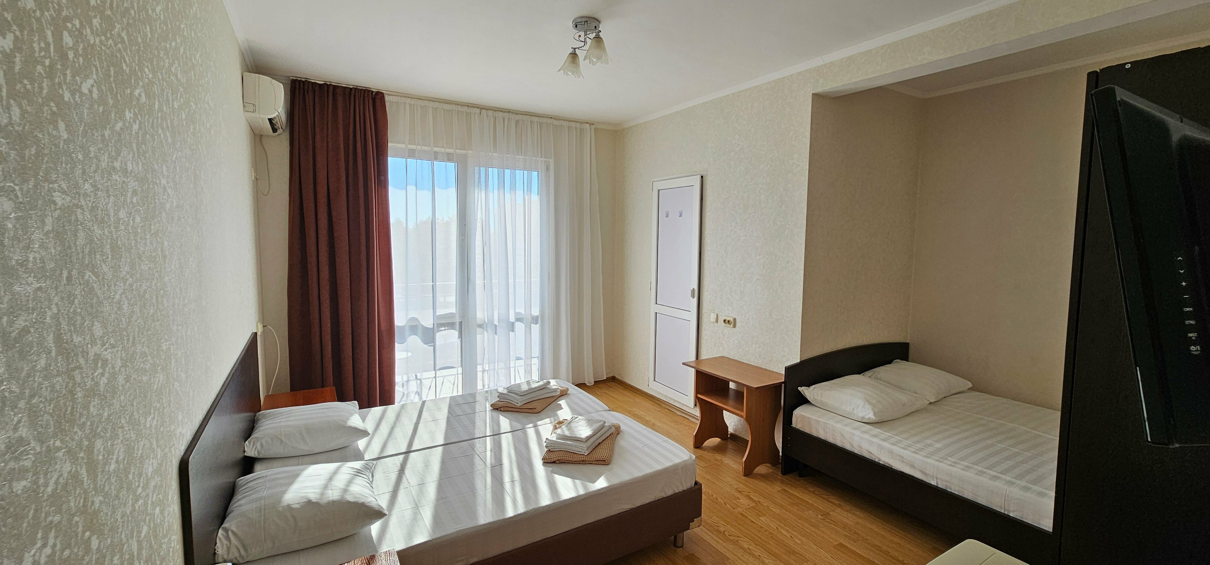 Четырехместный номер с балконом