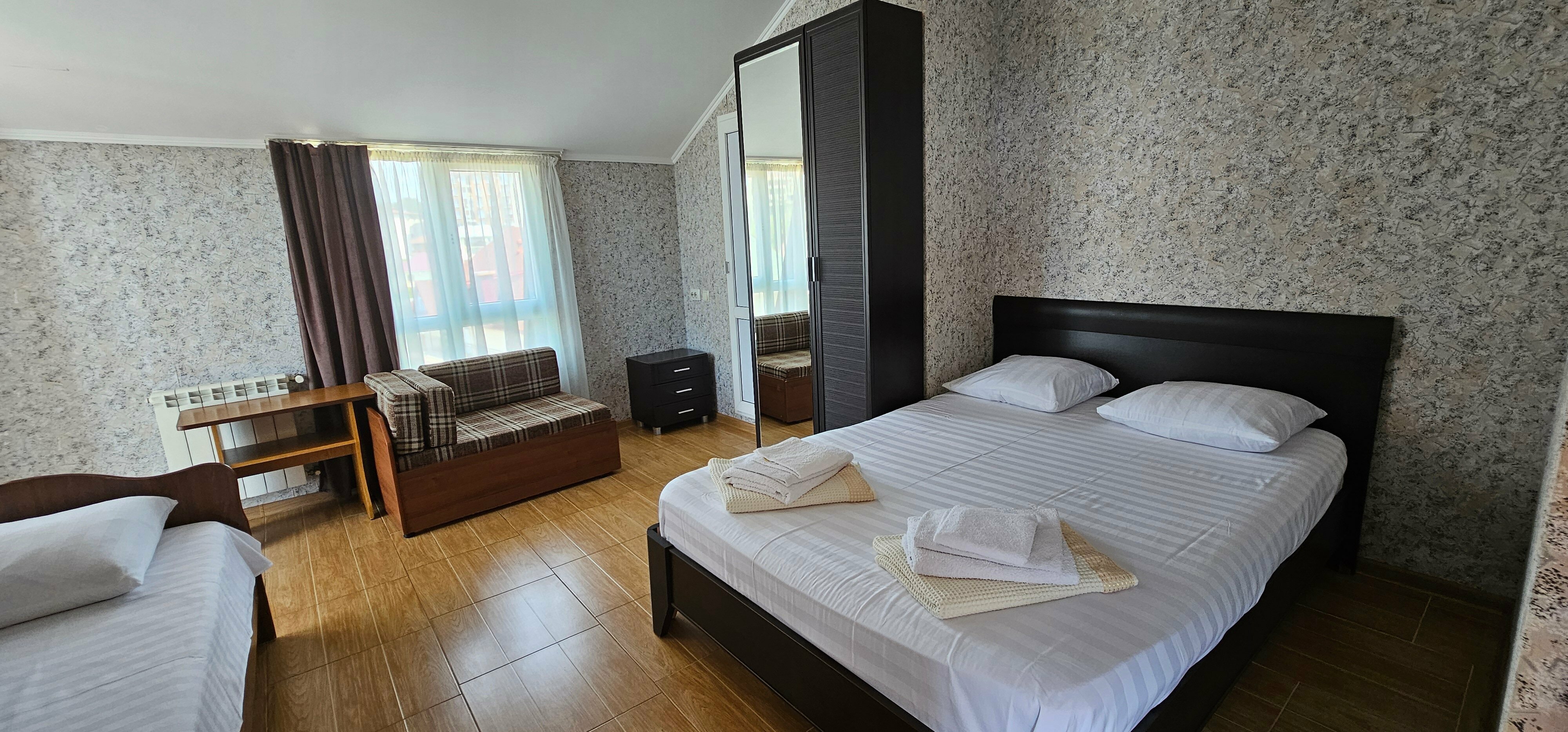 Четырехместный номер с балконом