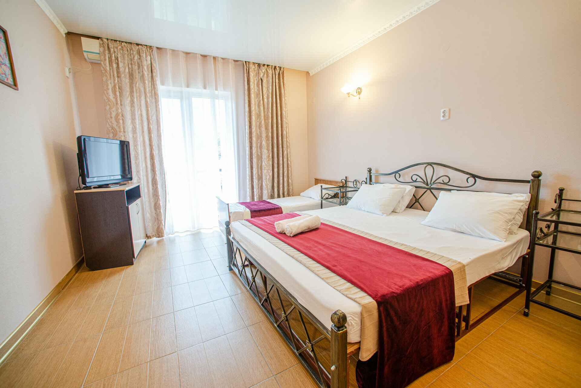 Трехместный номер Делюкс