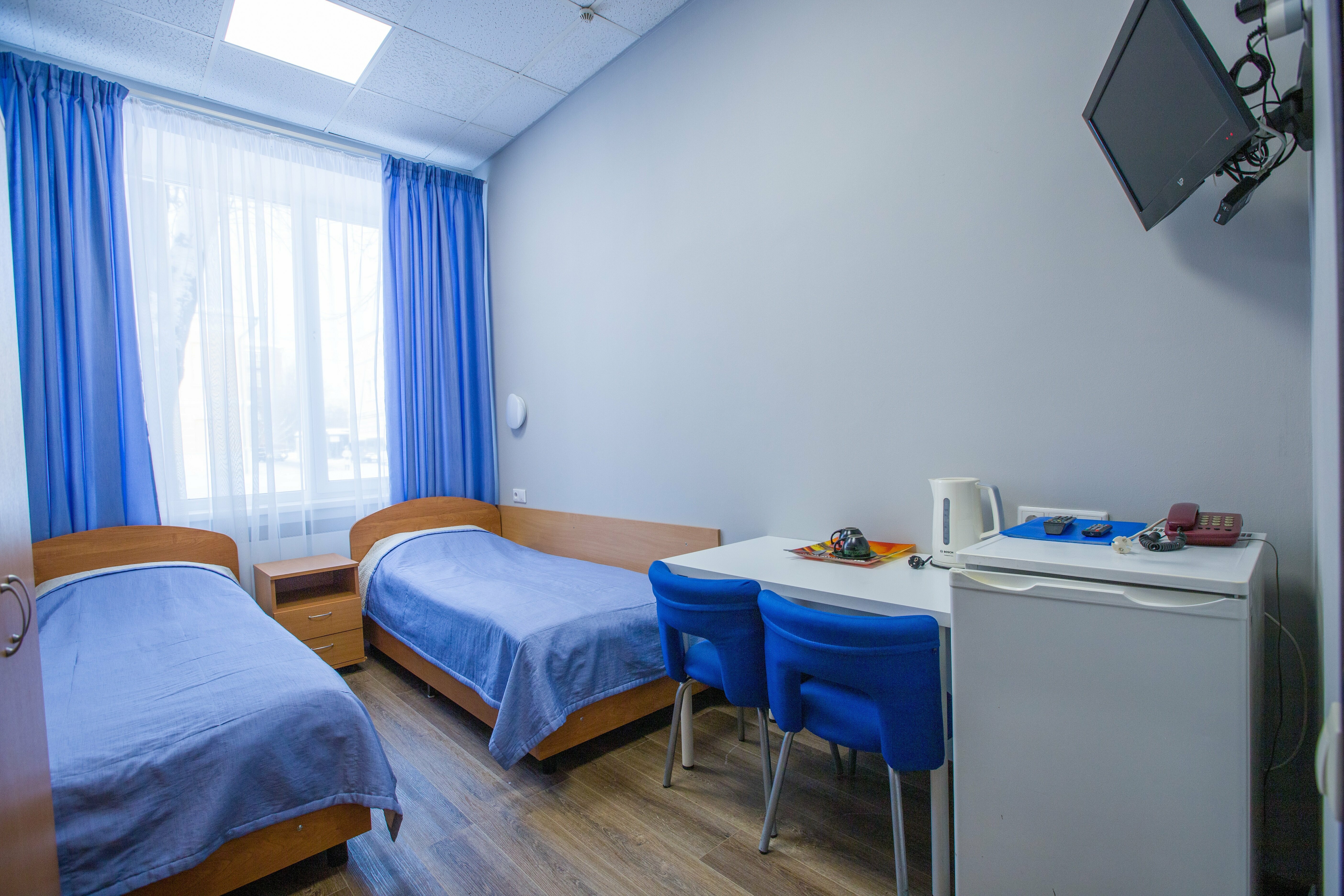 Двухместный номер с 2 отдельными кроватями и душем